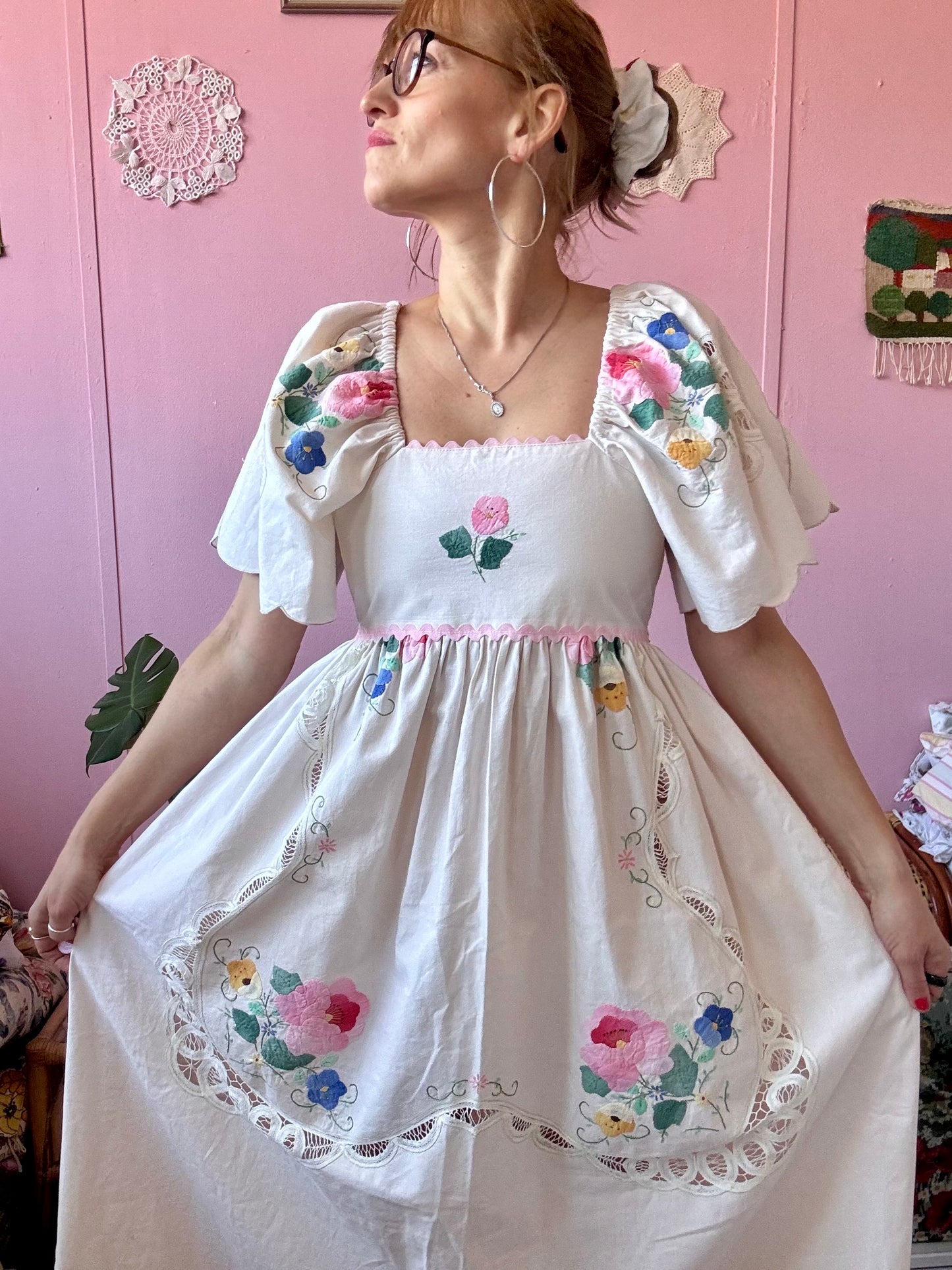Cream maxi dress with floral appliqués