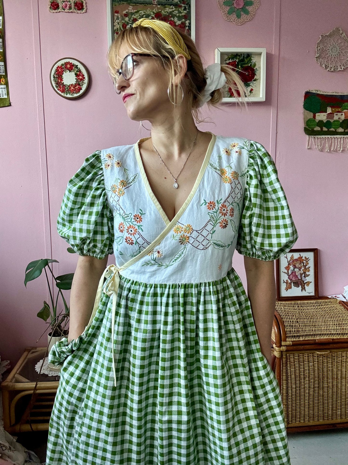 Wrap around dress with green gingham and embroidery
