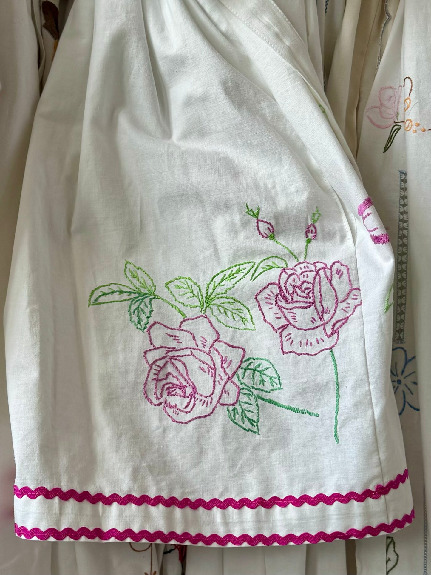 White dress with lace,pink roses and ric rac