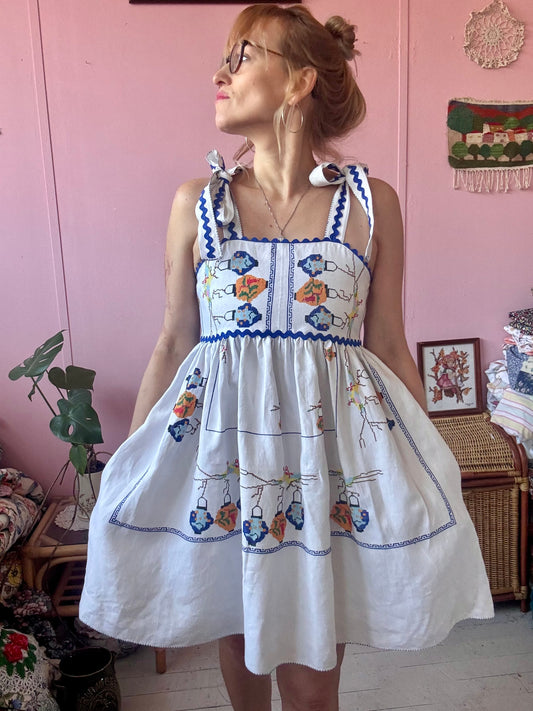 Linen mini dress with cross stitching