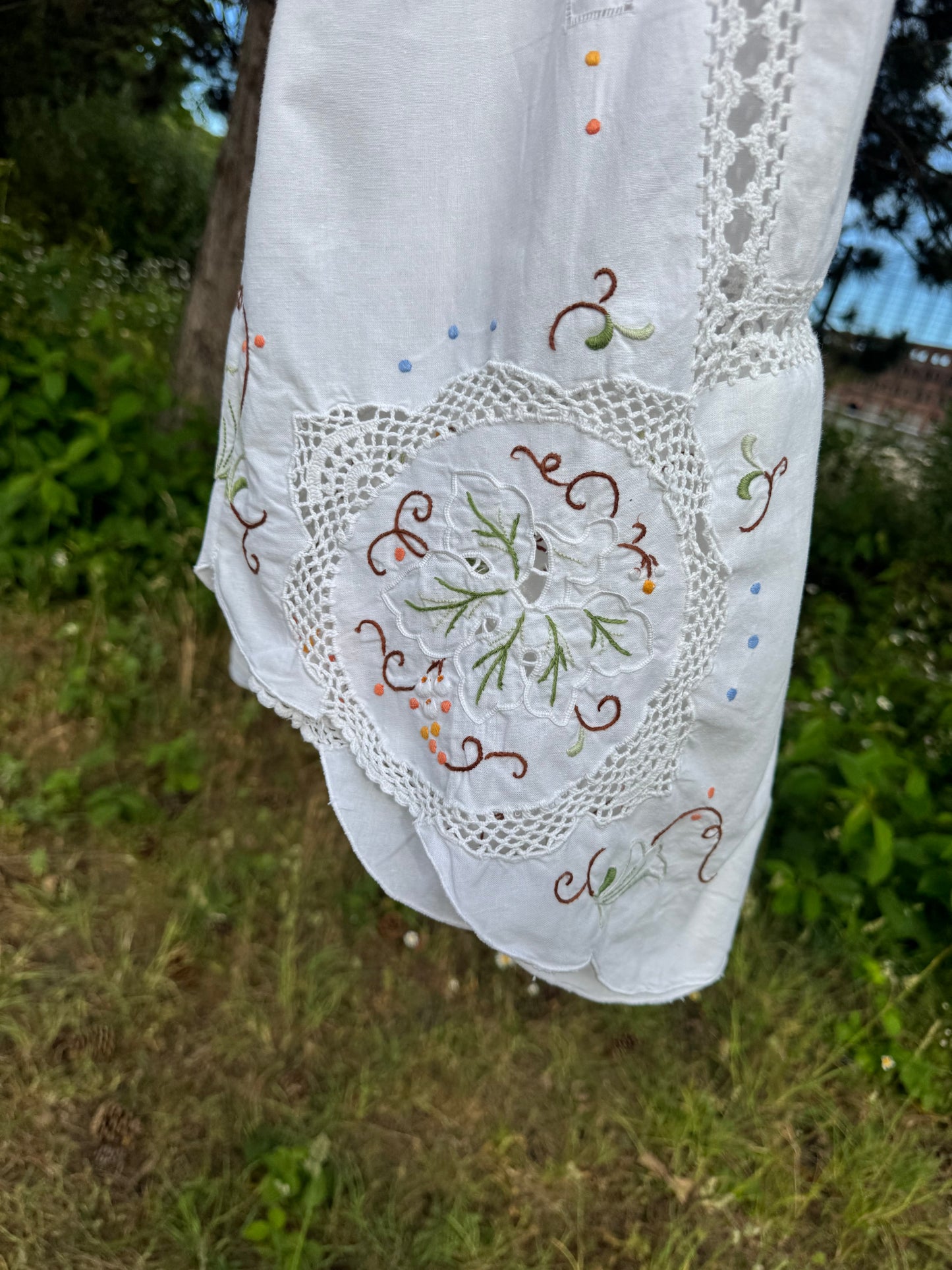 White maxi dress with embroidery and lace