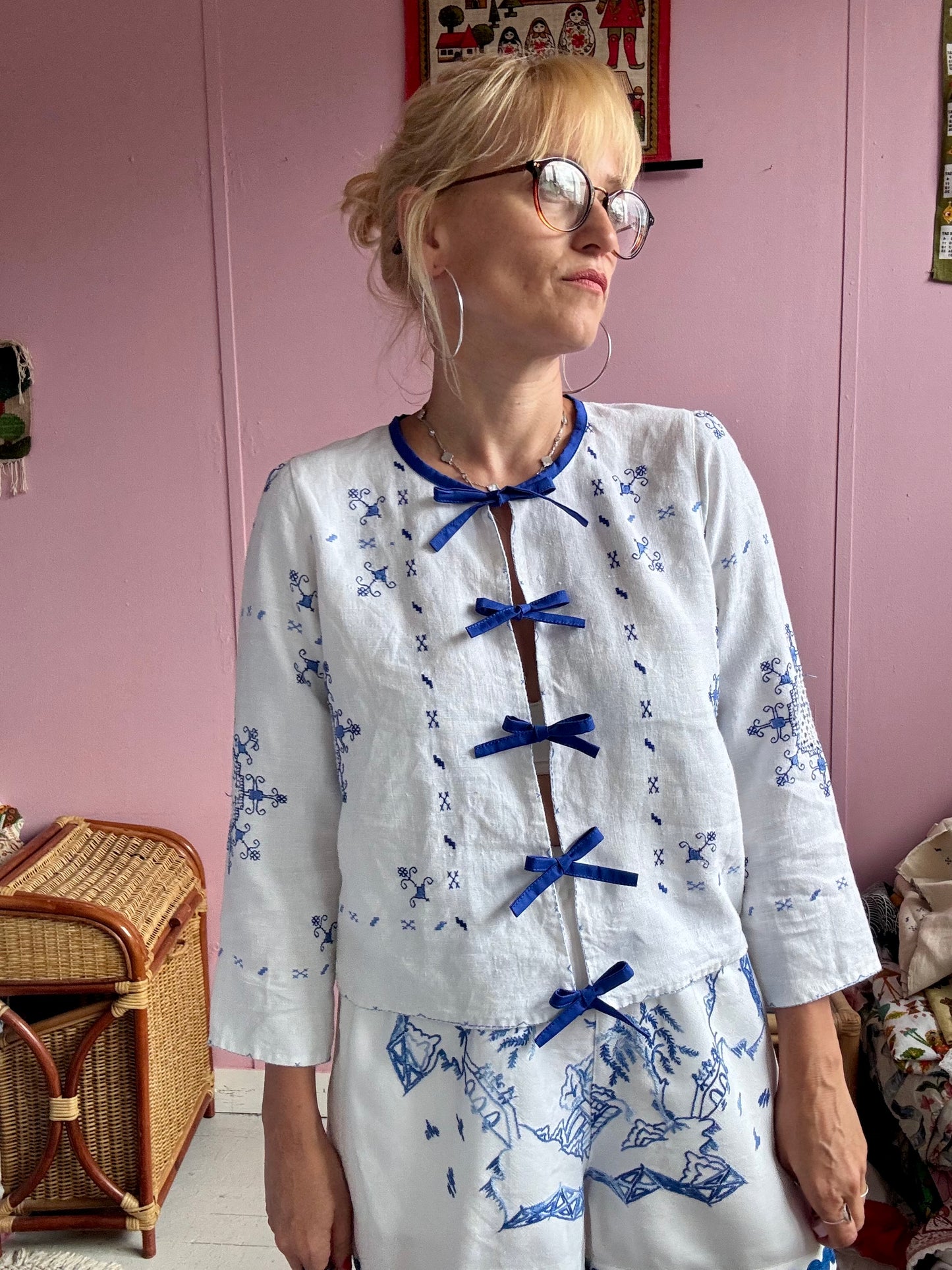 White linen blouse/light jacket with blue bows