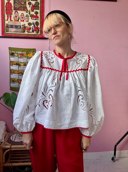 White embroidery blouse with red ric rac