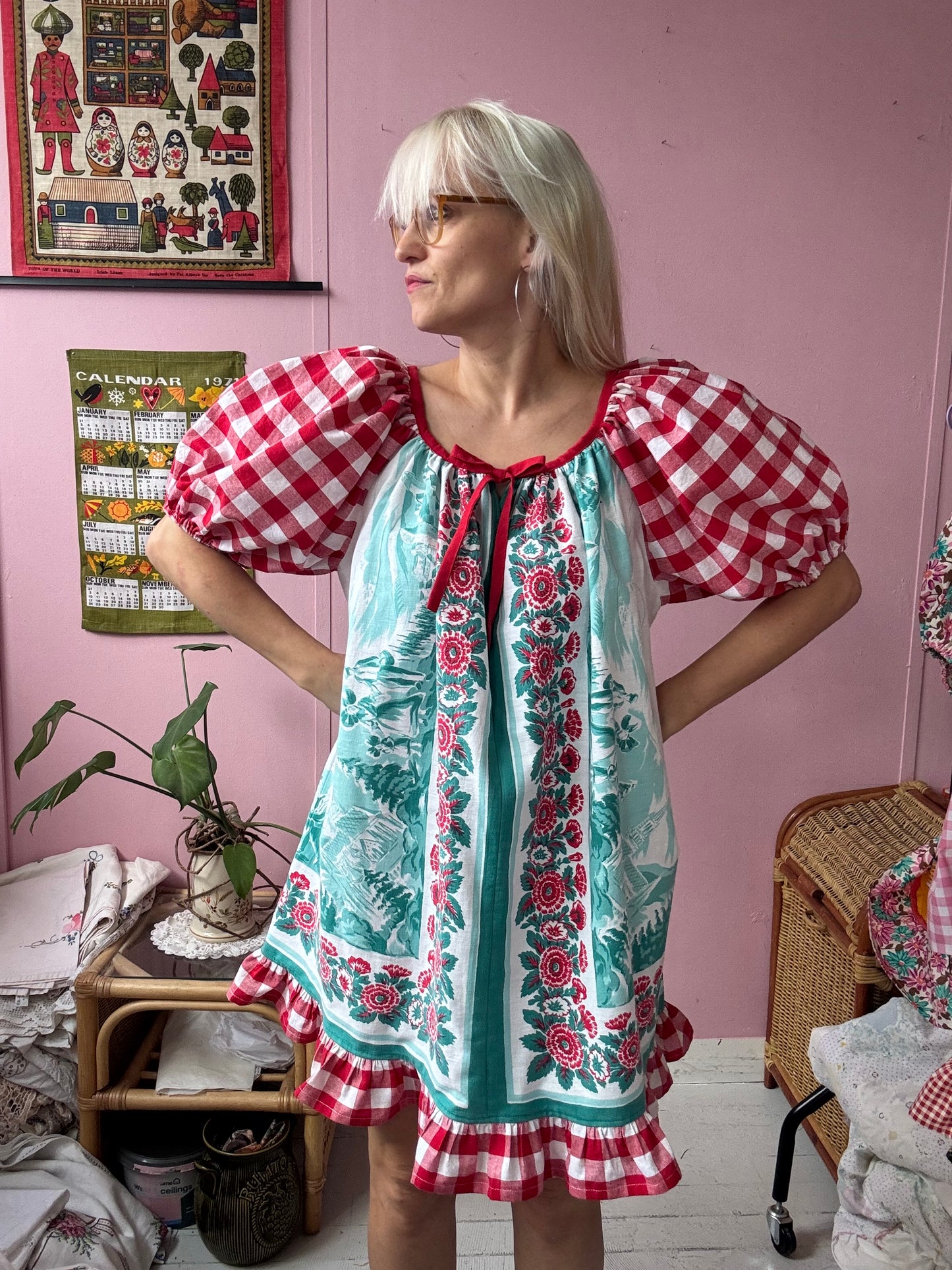 Vintage Tyrol village and red gingham dress