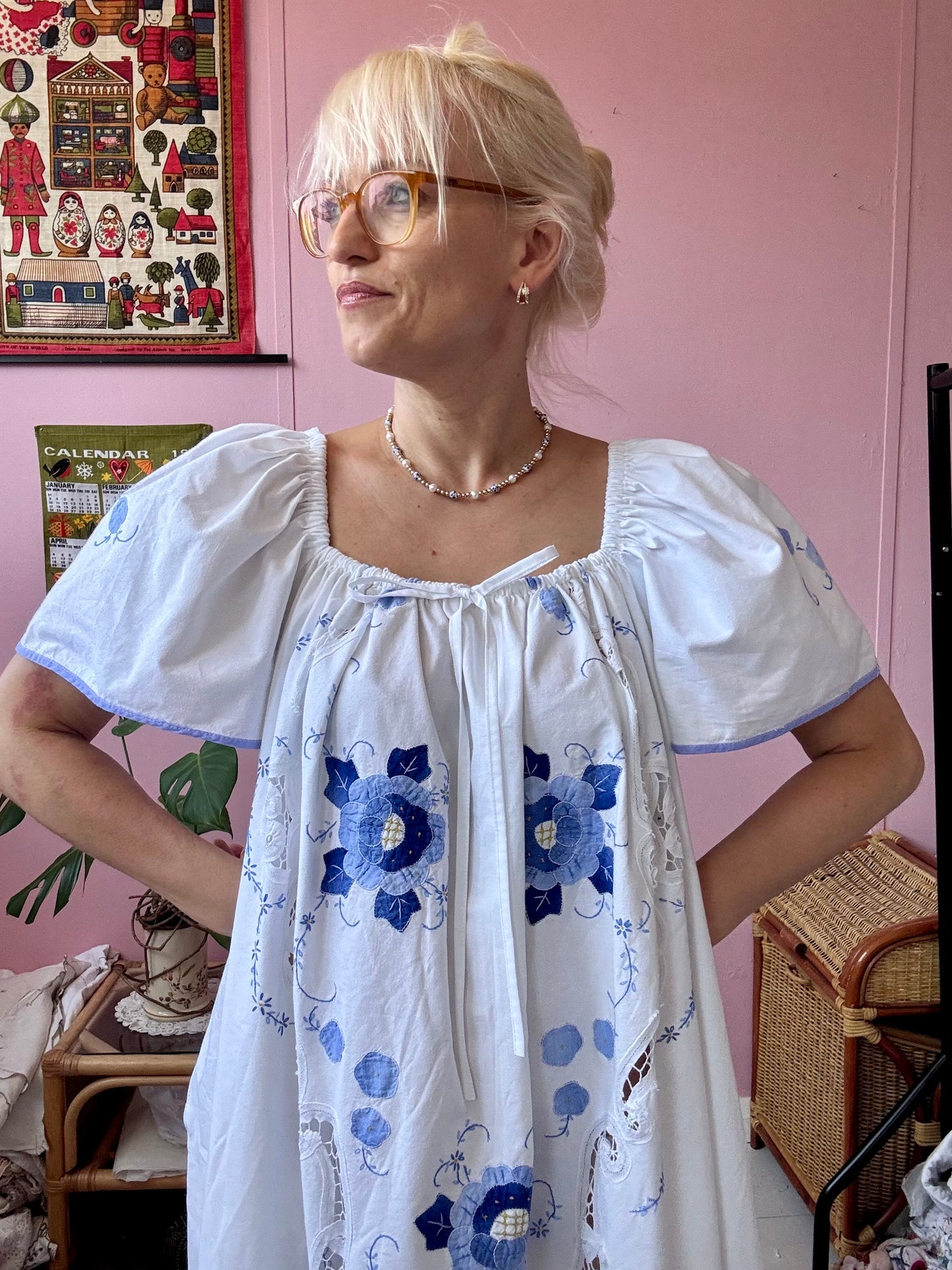Maxi dress with blue floral appliqués