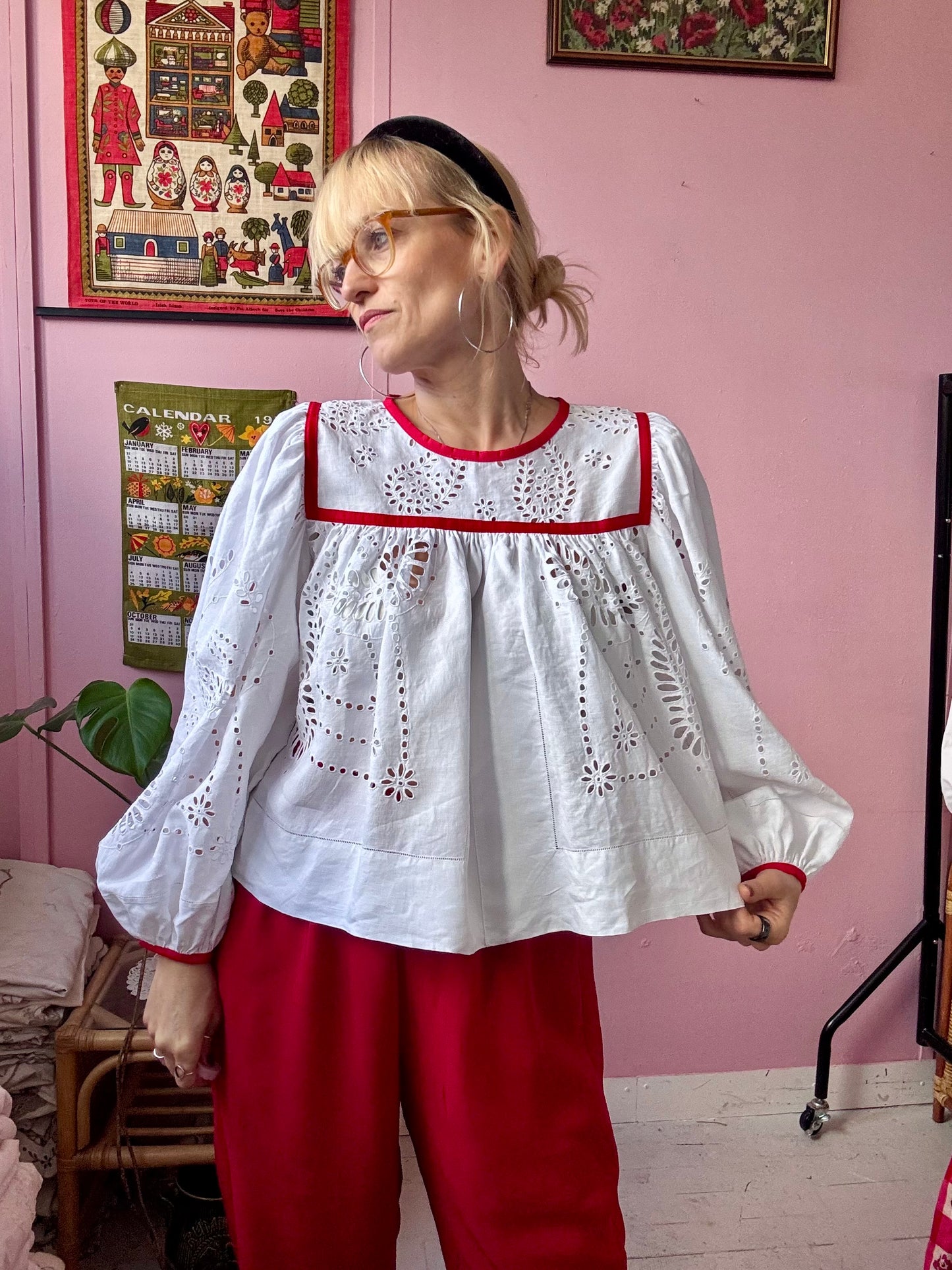 White blouse with red binding