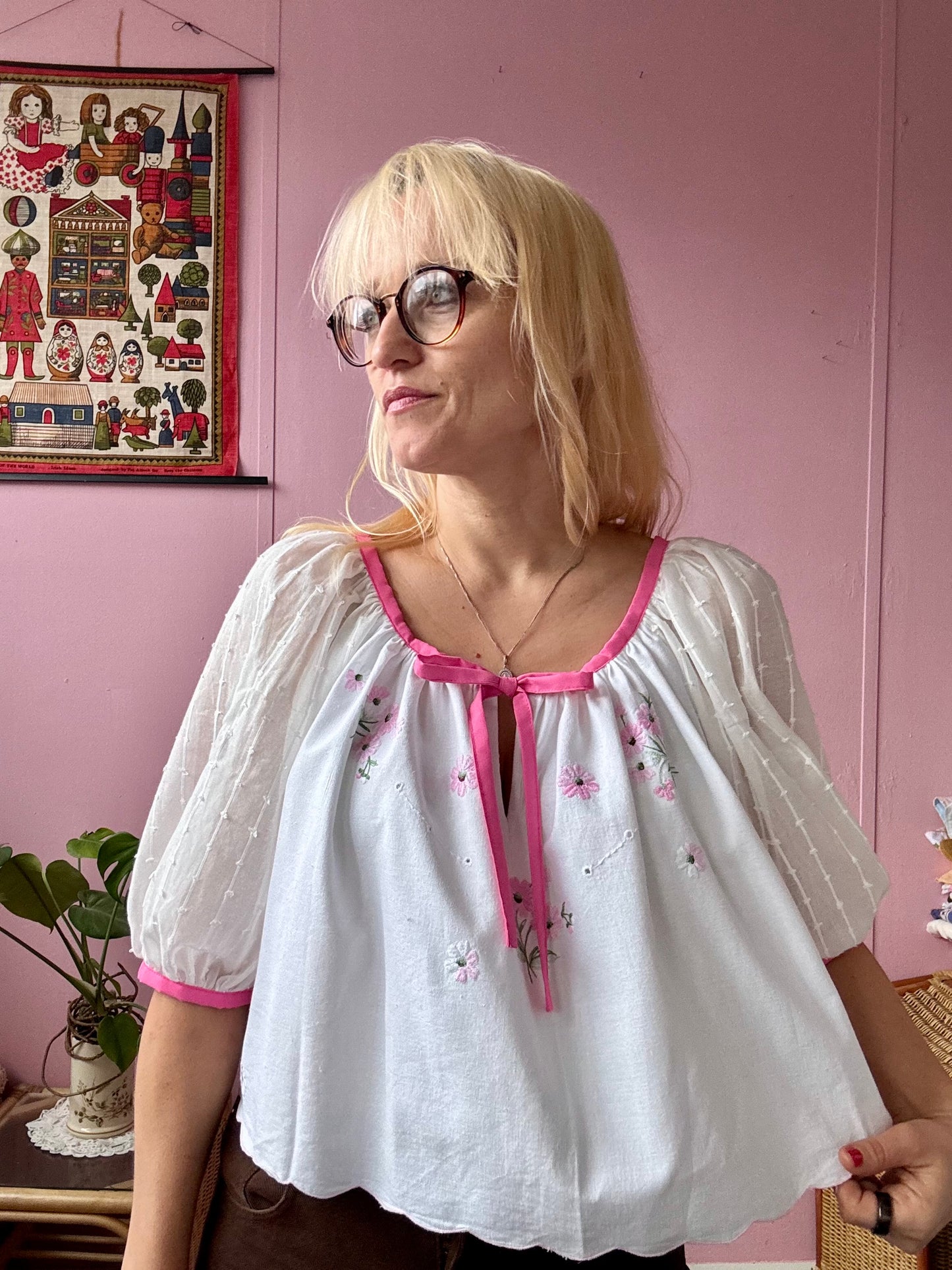 White blouse with pink binding
