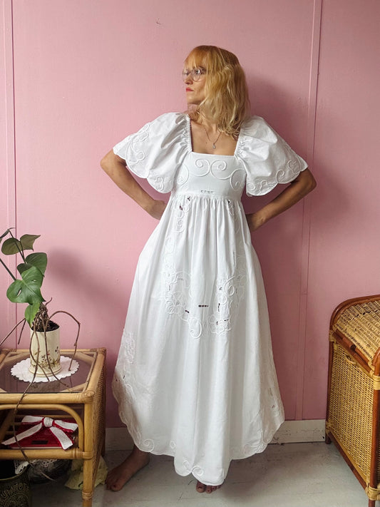 White maxi dress with floral embroidery