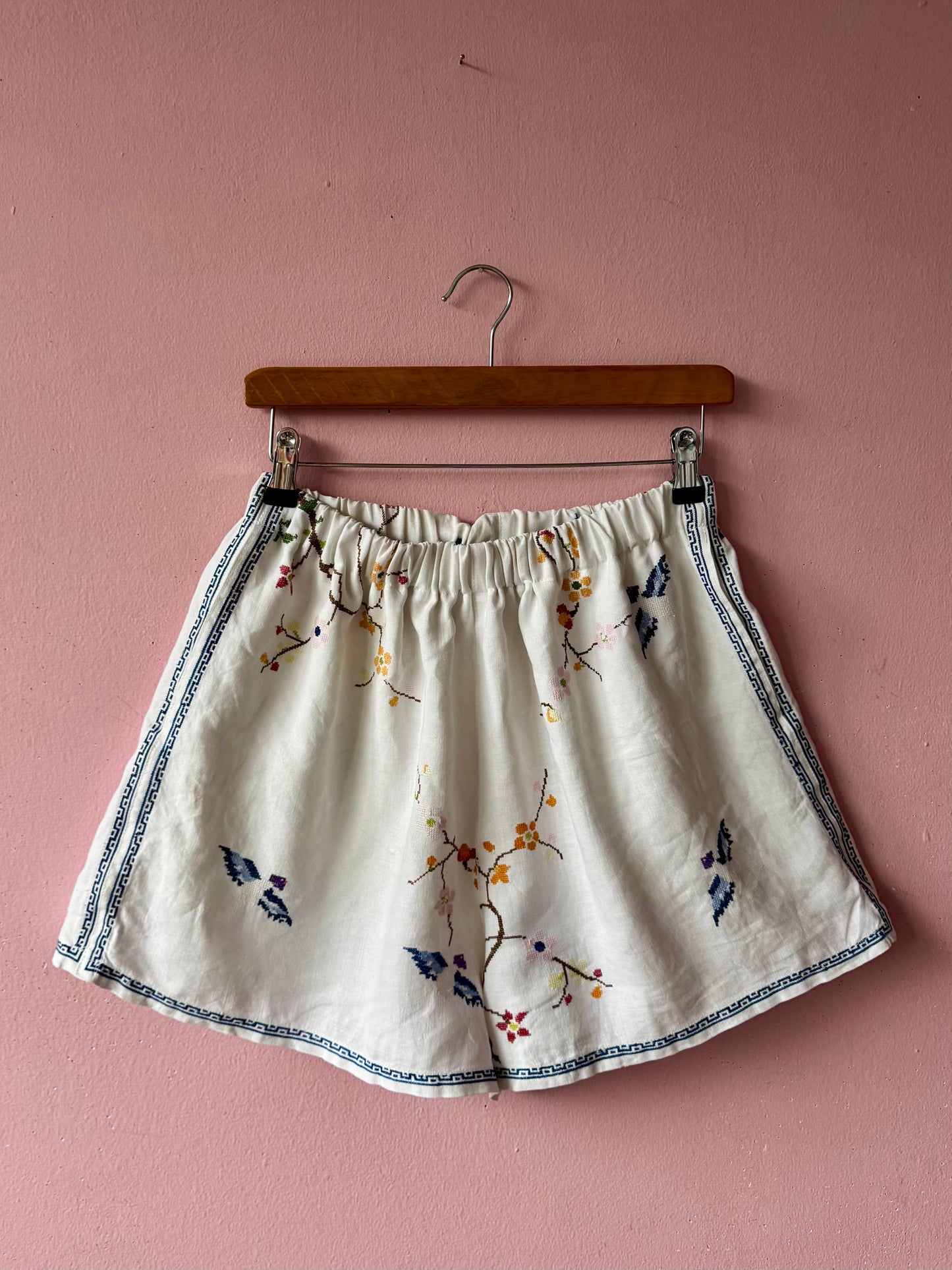 Linen shorts with cross stitching embroidery