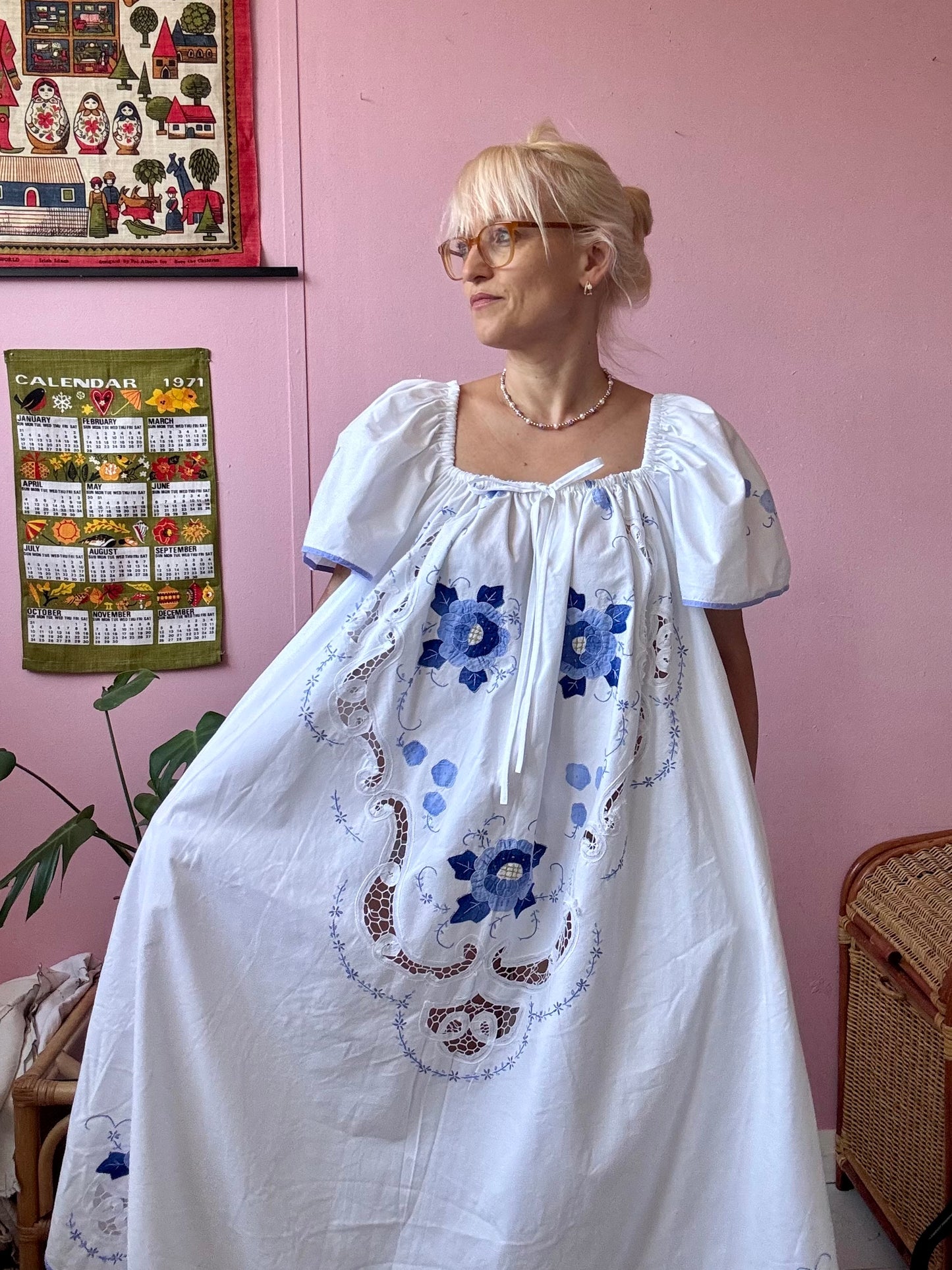 Maxi dress with blue floral appliqués