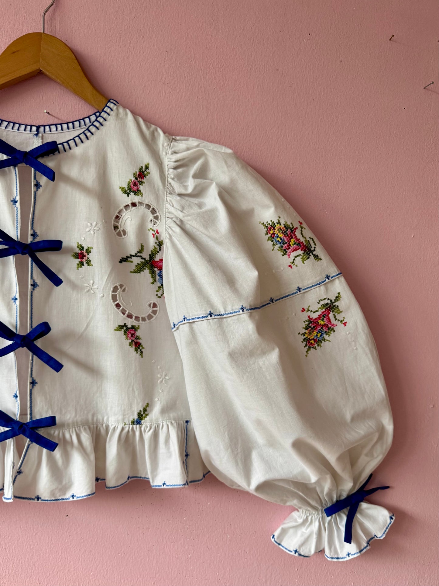 White embroidery blouse with blue bows