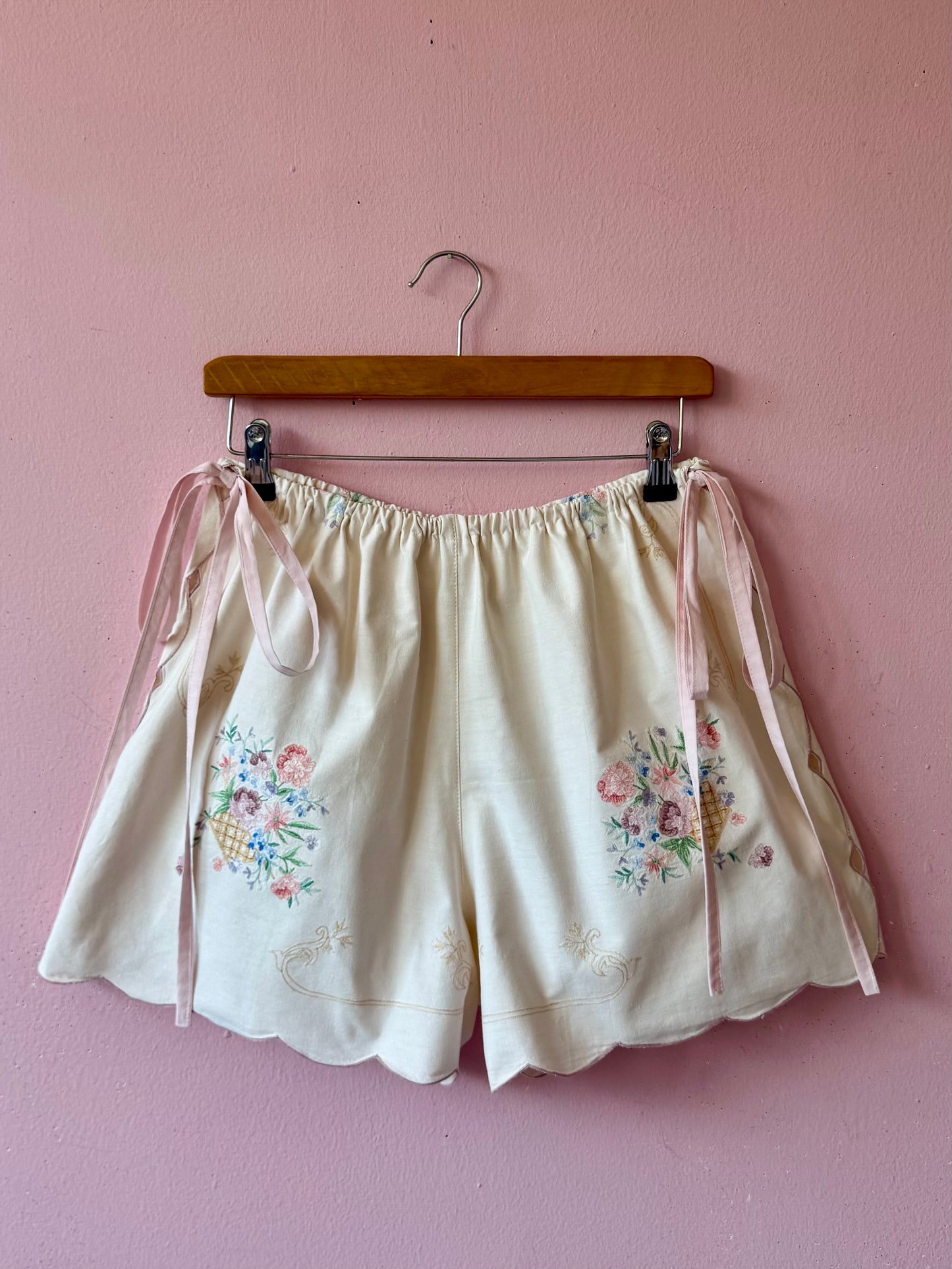 Cream shorts with pink bows
