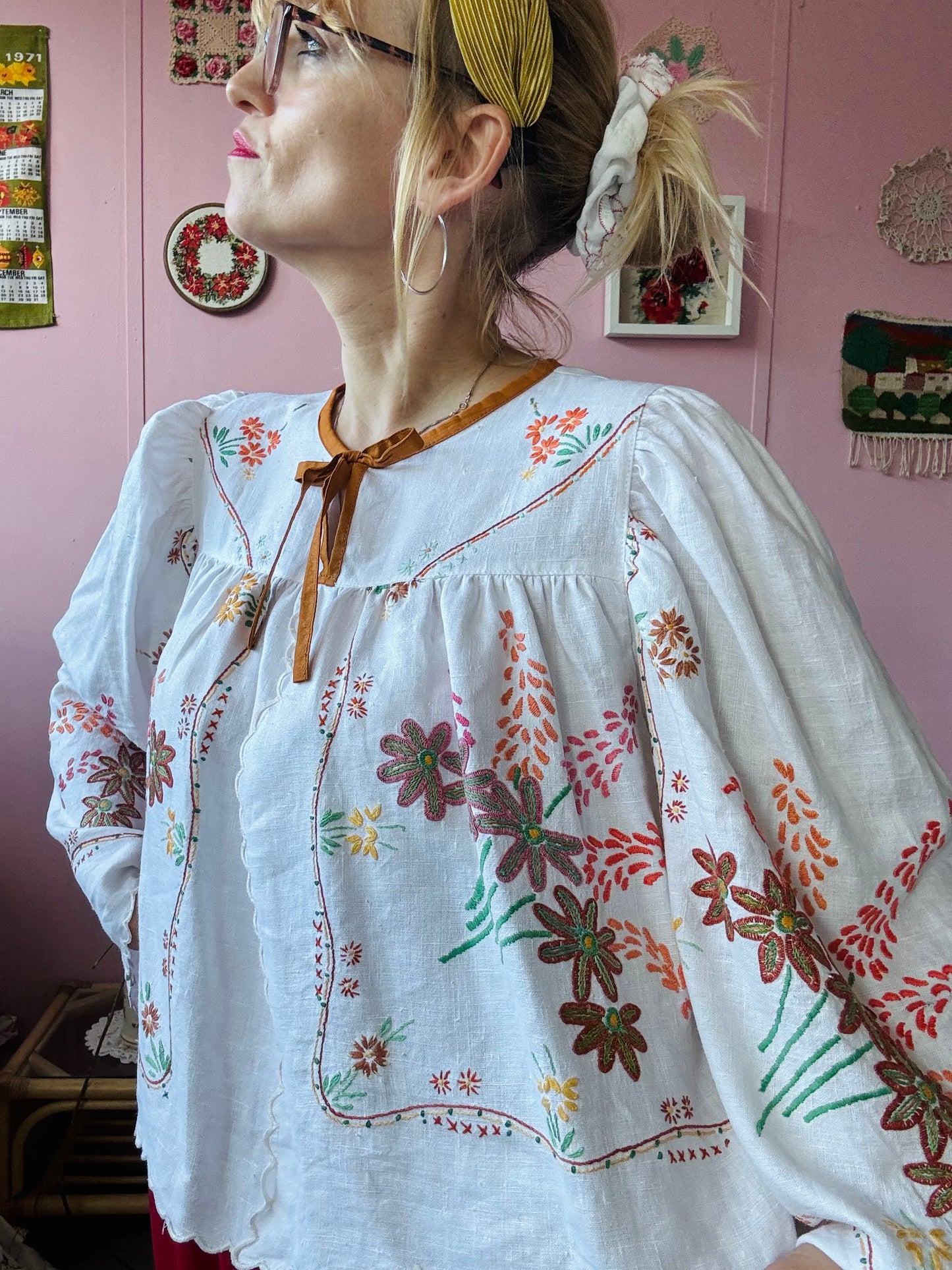 Linen blouse with floral embroidery and wide sleeves