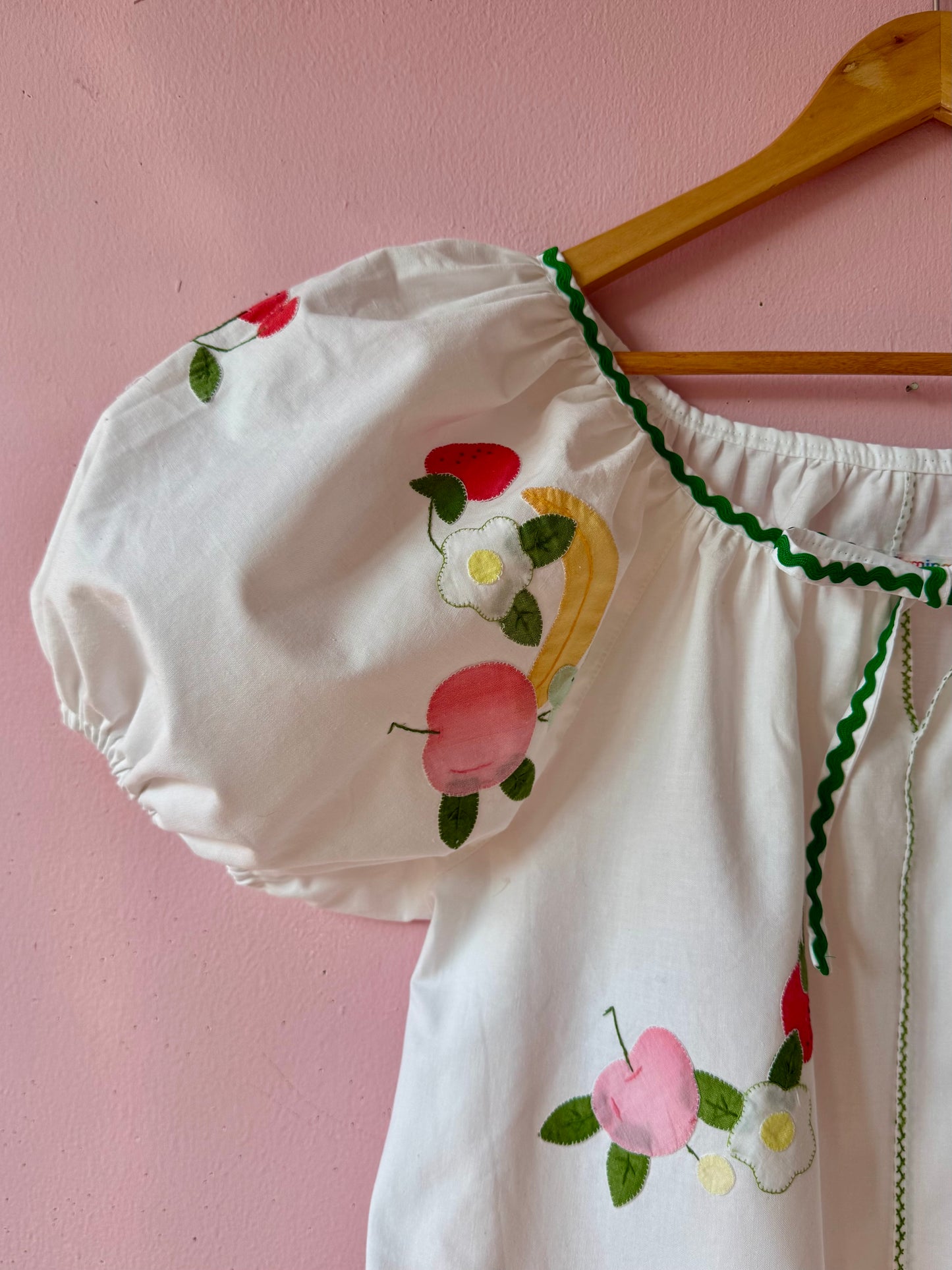 Fruity blouse with green ric rac