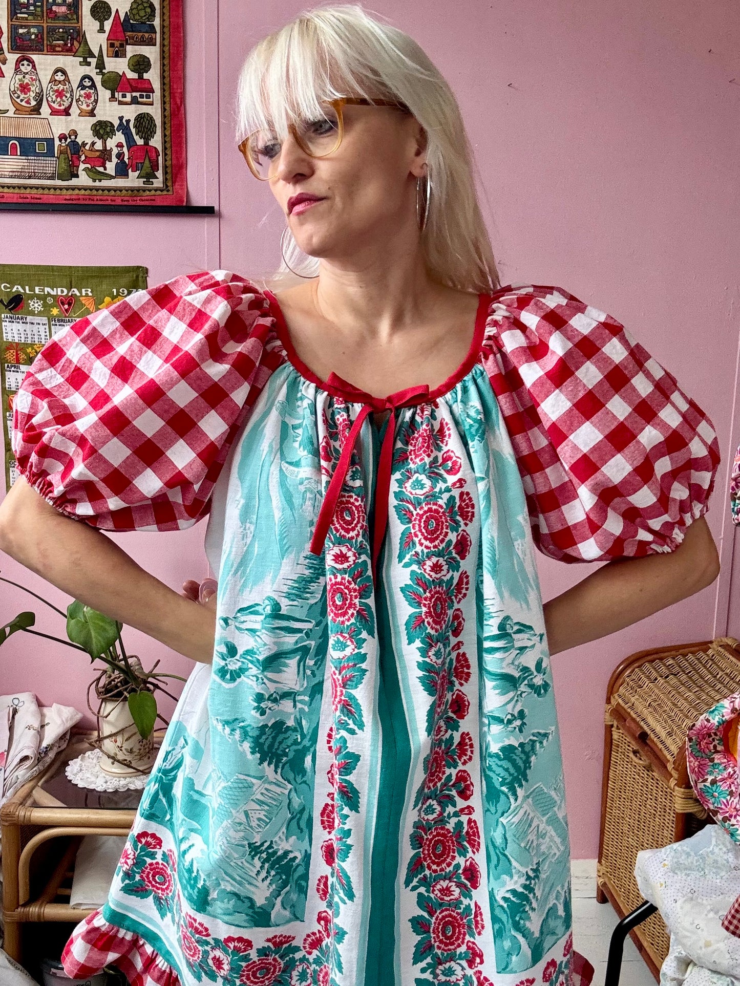 Vintage Tyrol village and red gingham dress