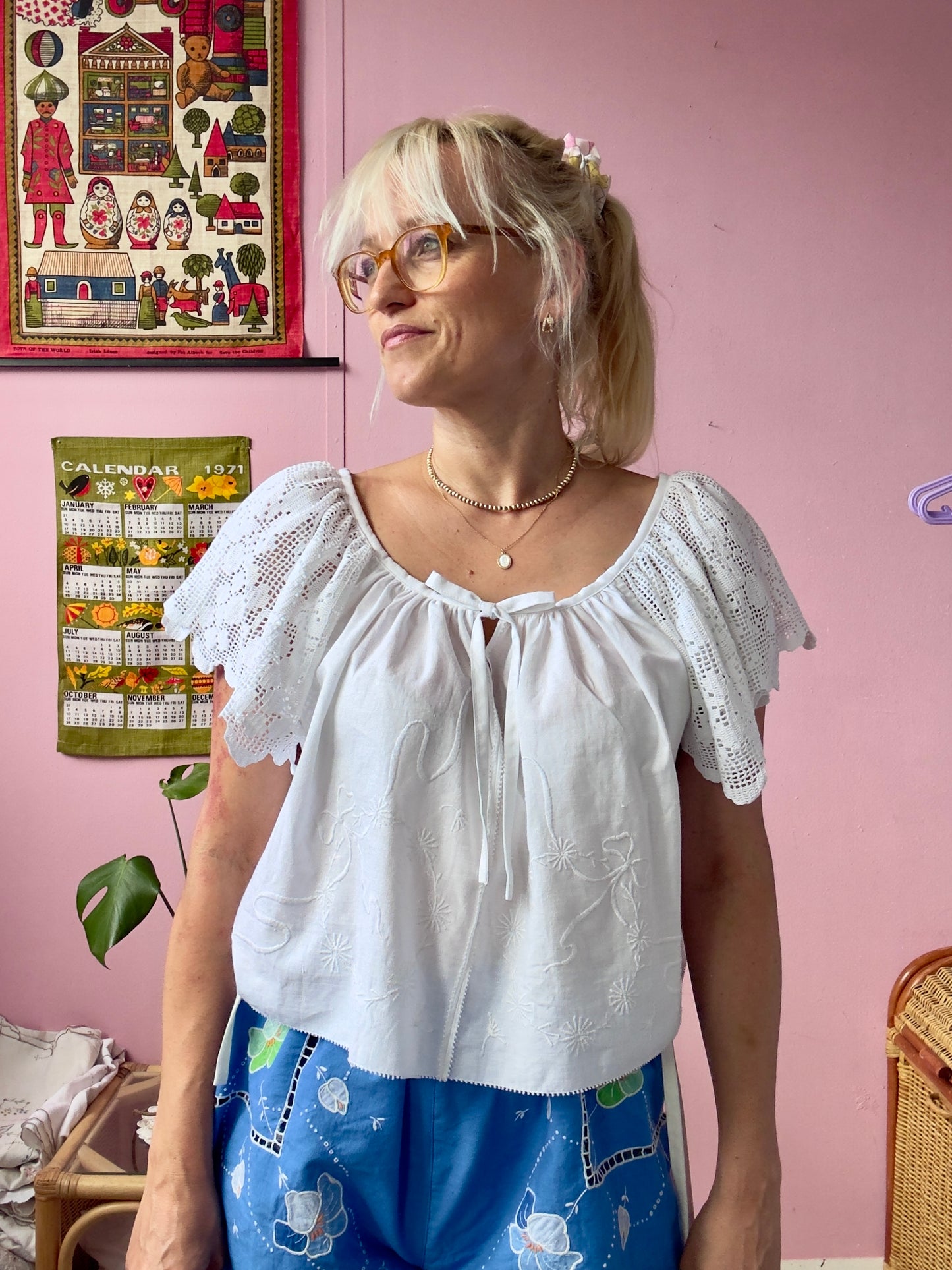 White blouse with lace sleeves