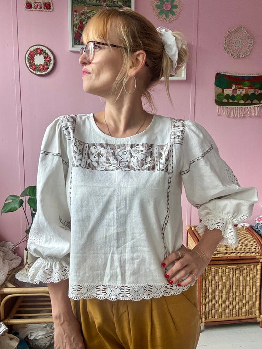 Ivory linen blouse with brown cross stitching and lace