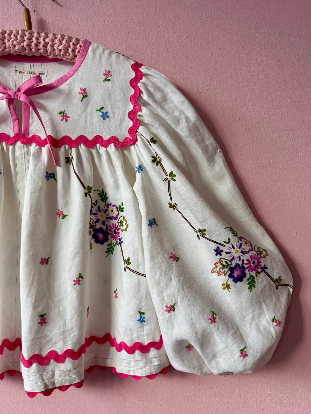 Linen floral blouse with pink ric rac