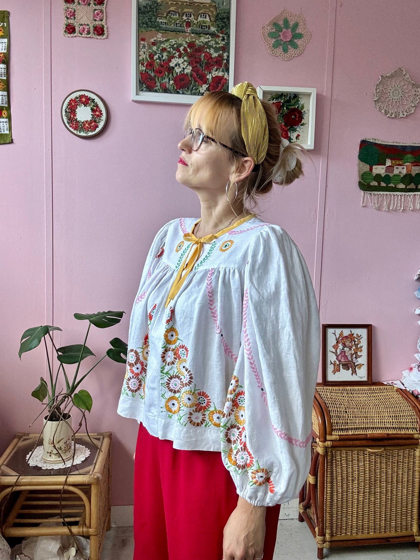 Linen blouse with floral embroidery and yellow binding