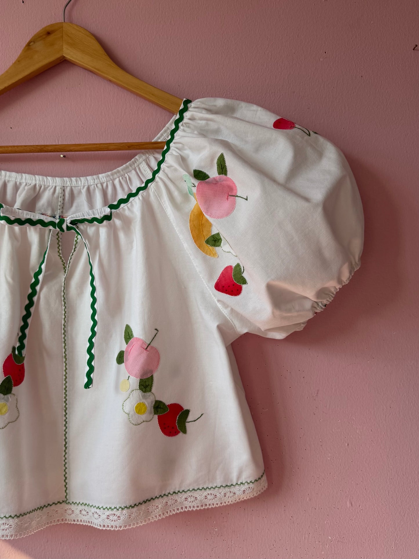 Fruity blouse with green ric rac