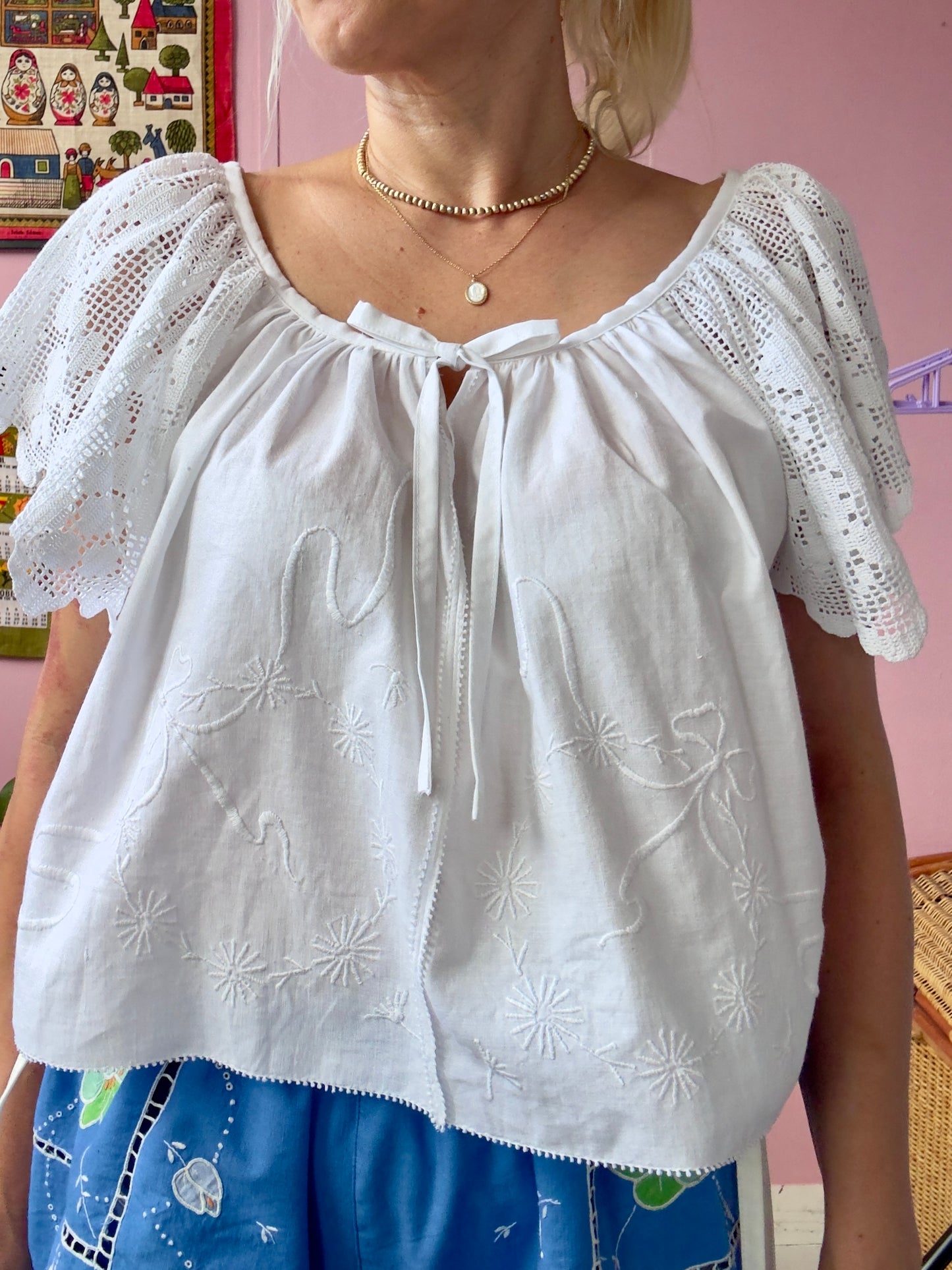 White blouse with lace sleeves