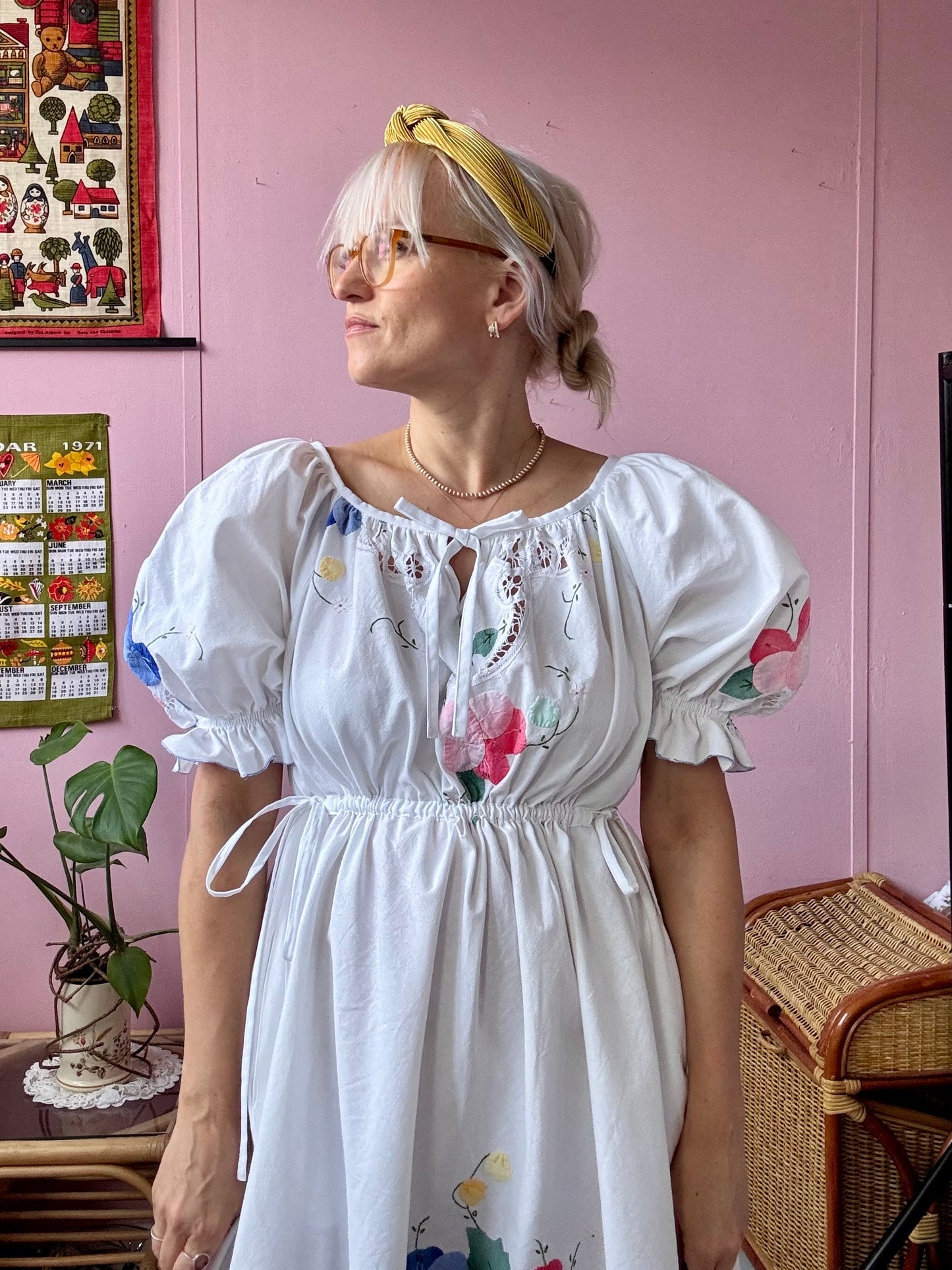 White mini dress with floral appliqués
