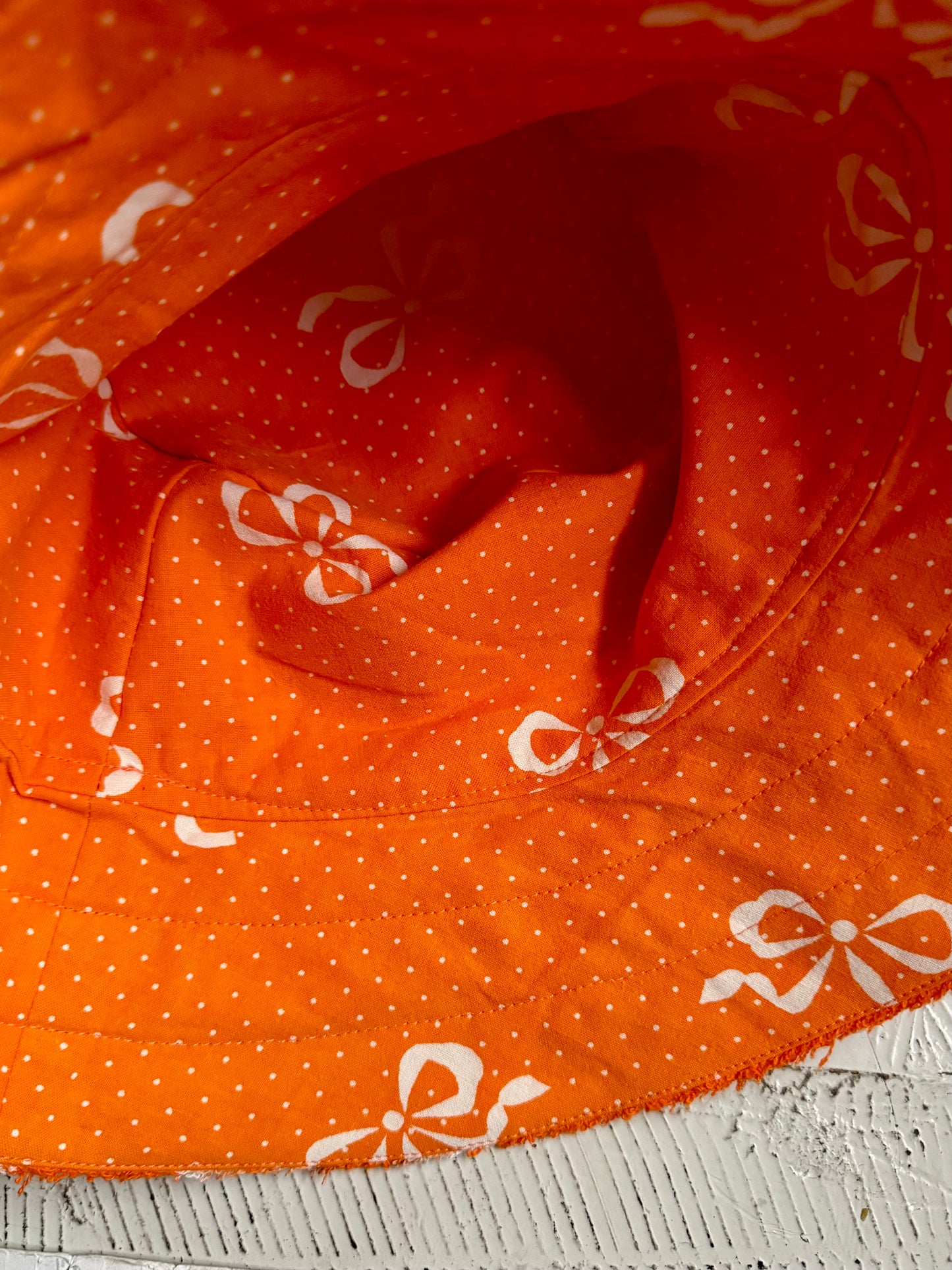 Orange floral bucket hat