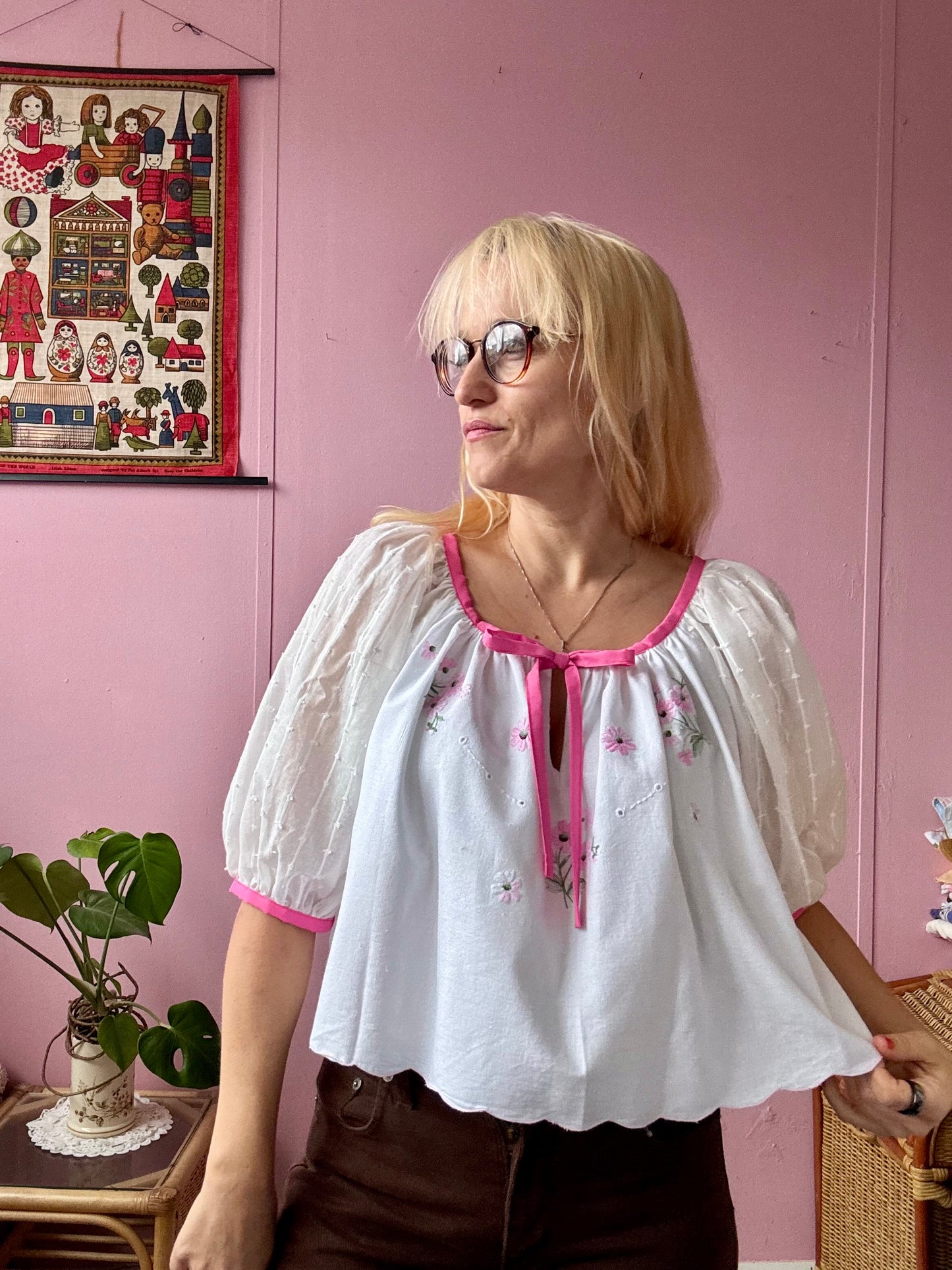 White blouse with pink binding