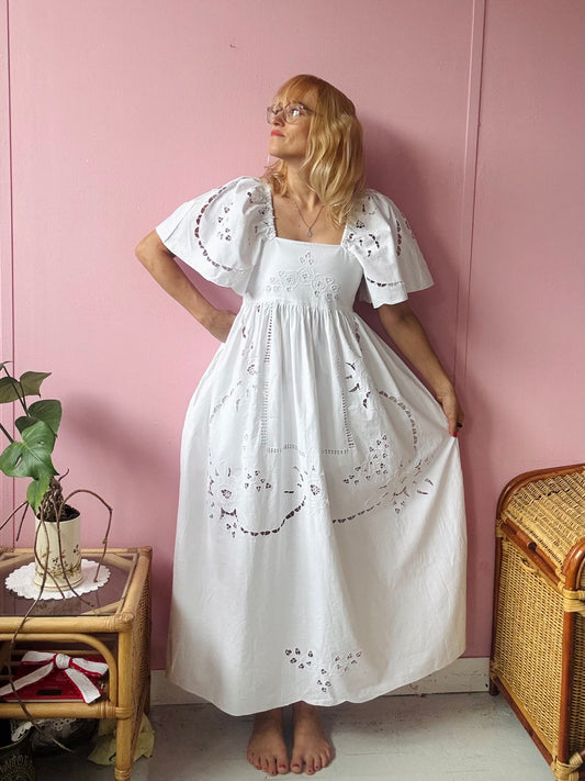 White maxi dress with floral cut out embroidery