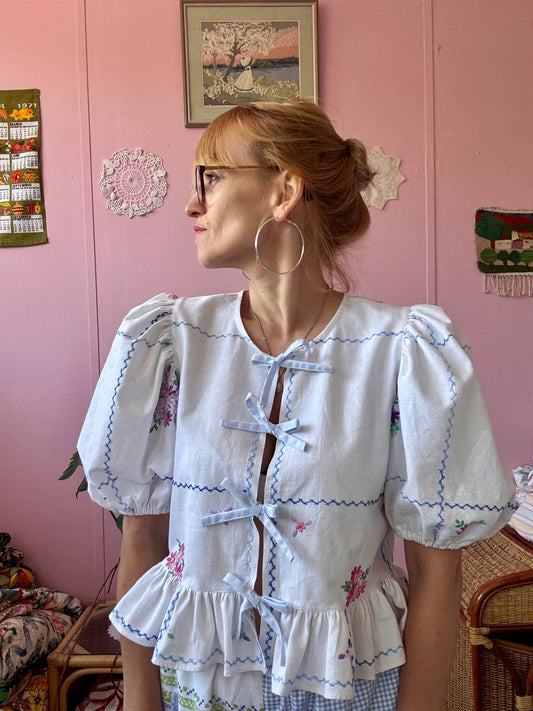 Floral blouse with light blue bows