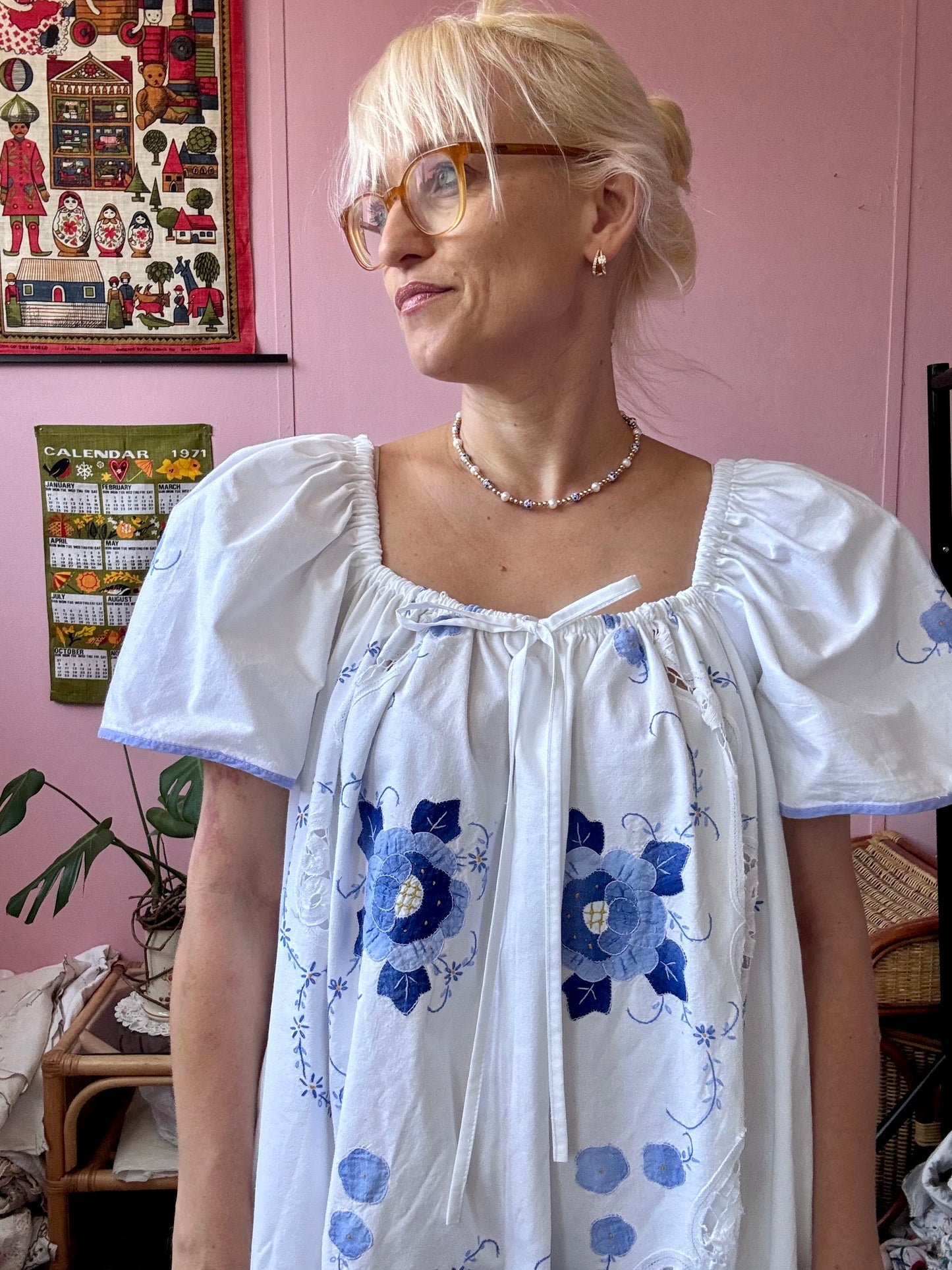 Maxi dress with blue floral appliqués