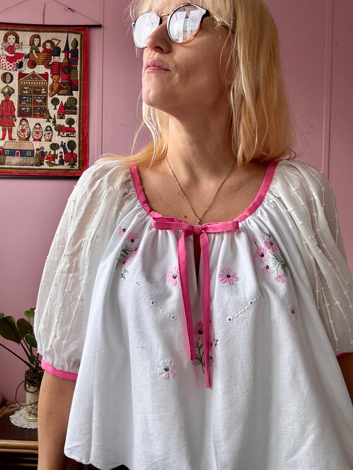 White blouse with pink binding