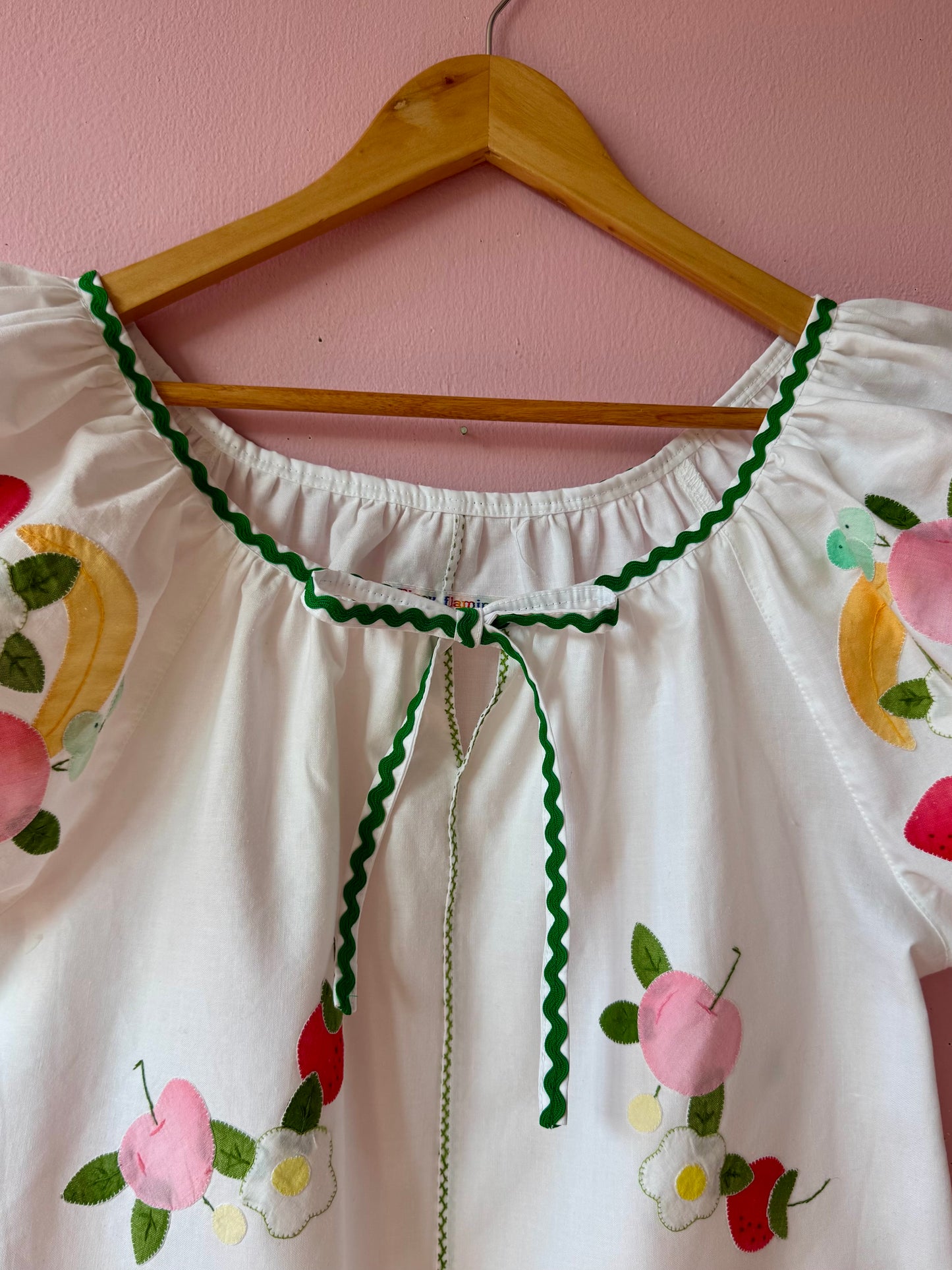 Fruity blouse with green ric rac