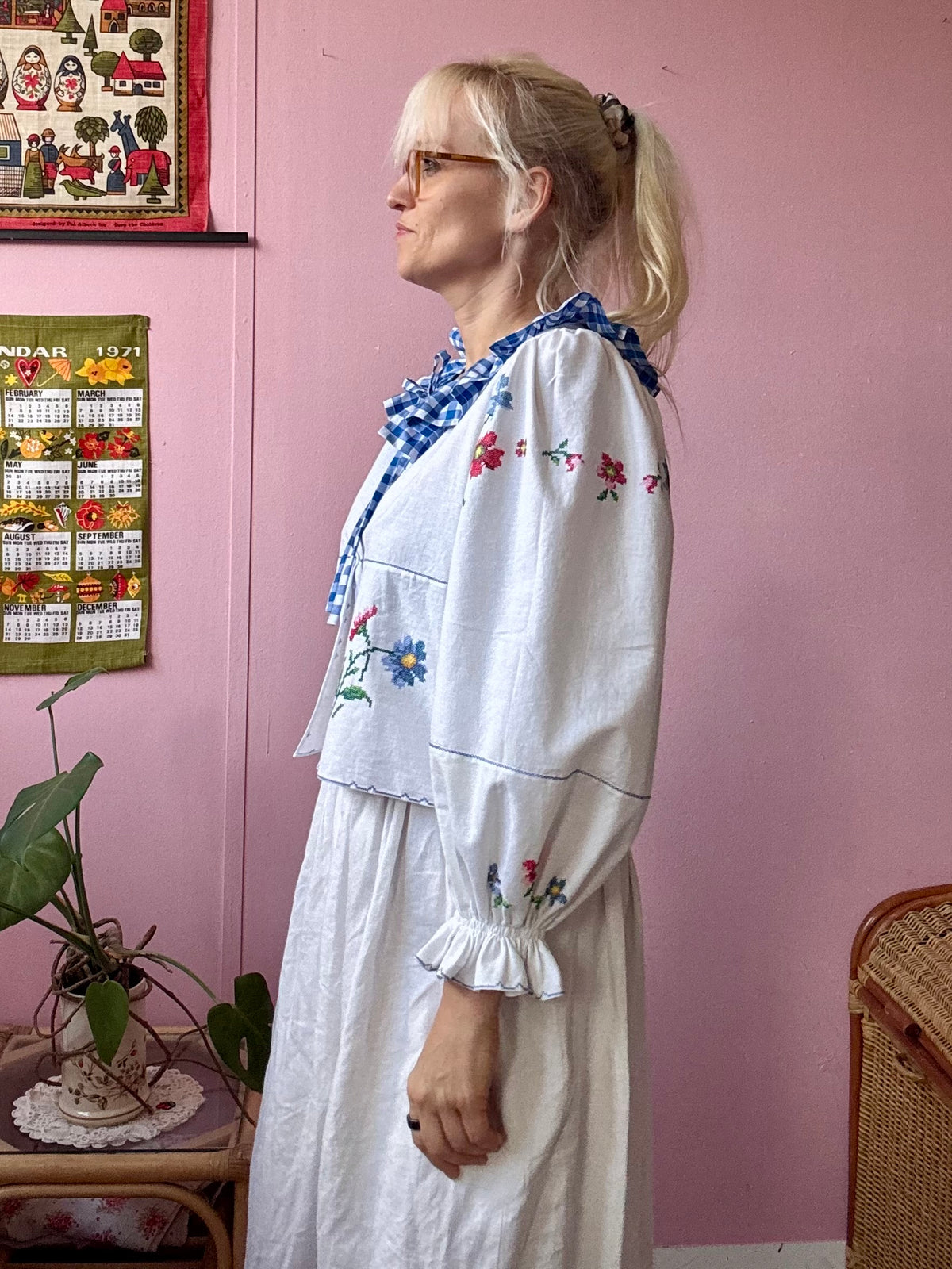 White blouse with blue ric rac neckline frill