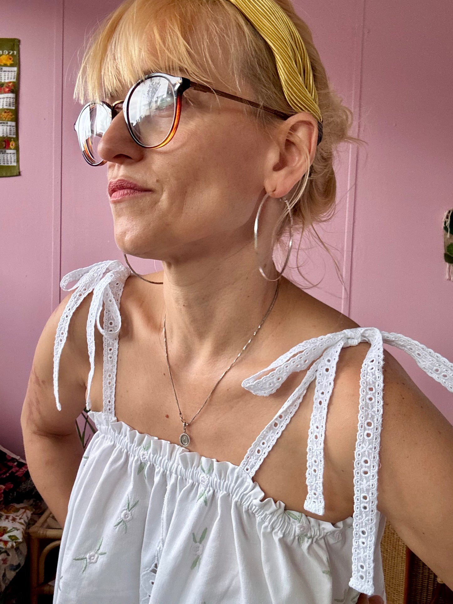 Summer top with embroidery and lace straps