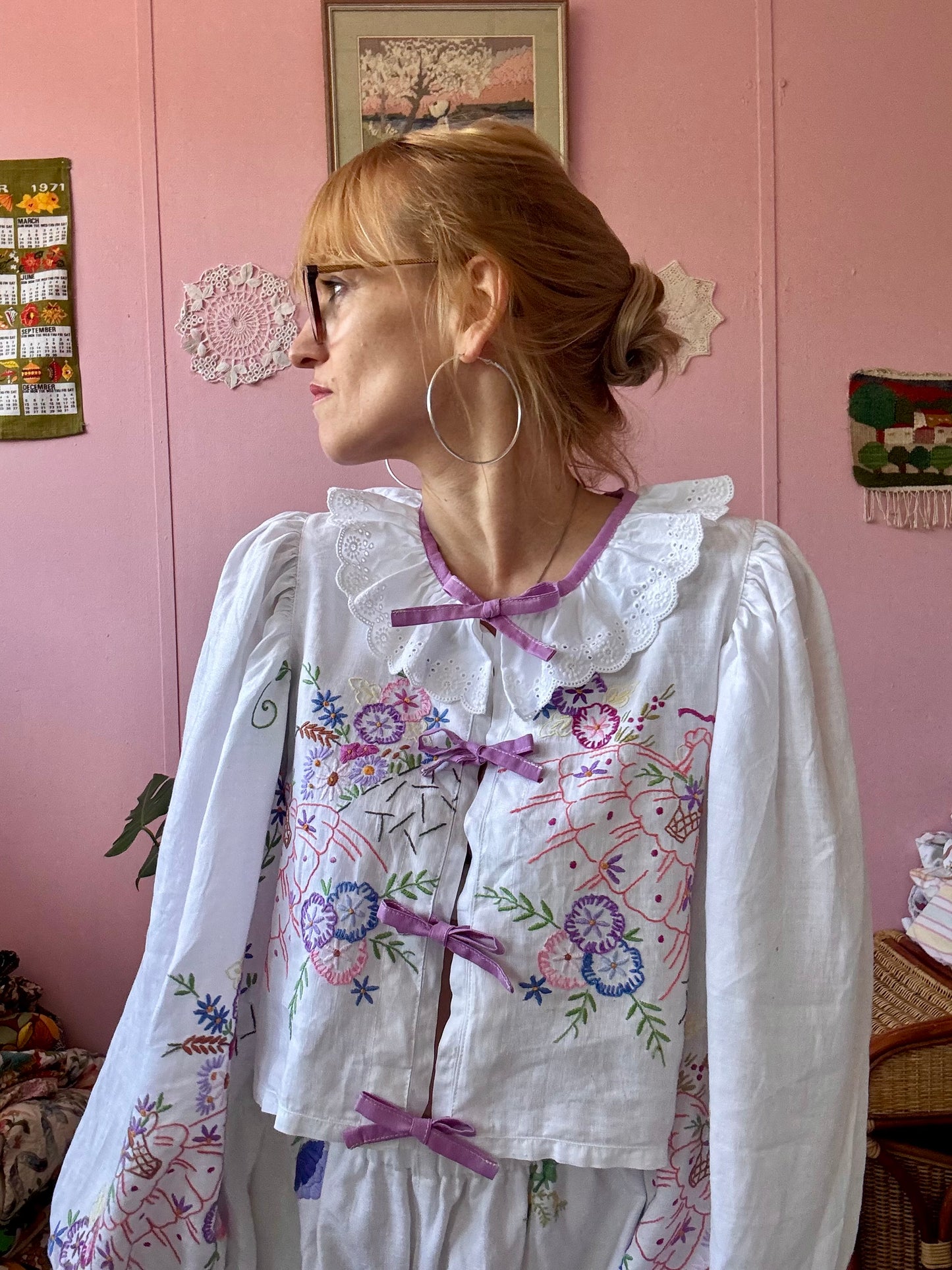 Blouse with lace neckline and lilac trimming