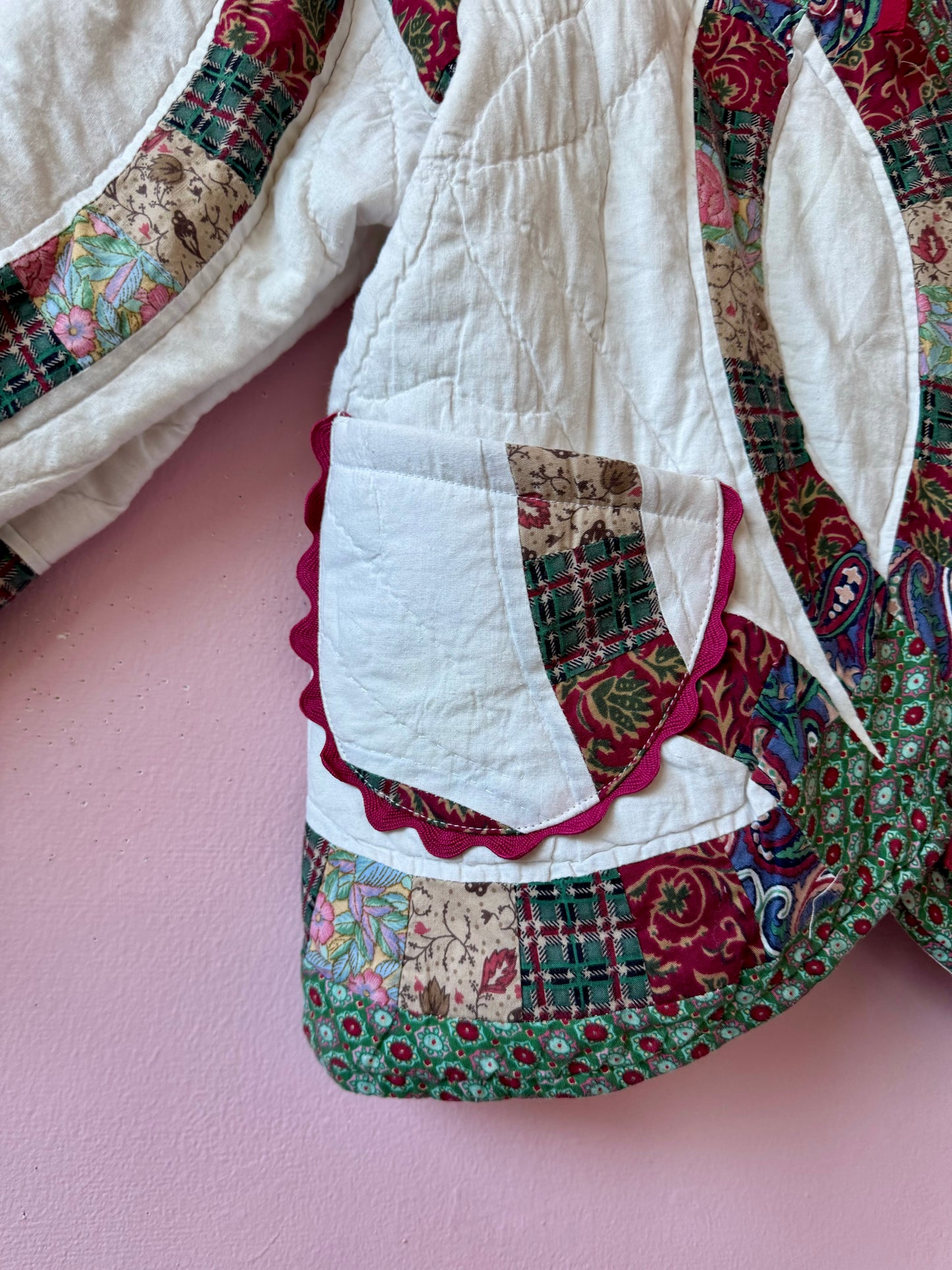 Patchwork jacket with burgundy ric rac and bows