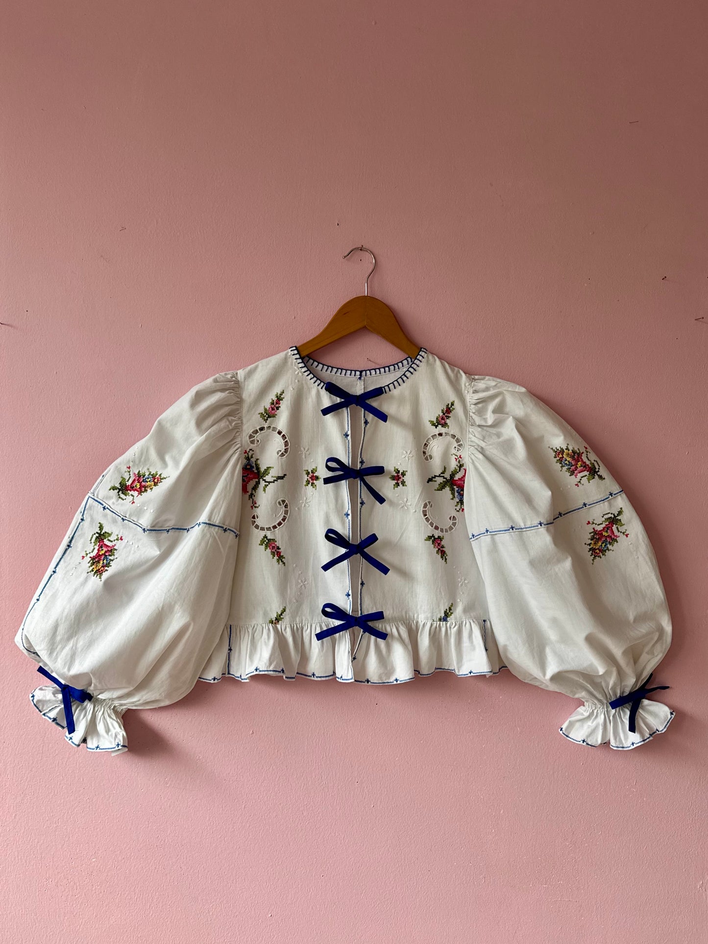 White embroidery blouse with blue bows