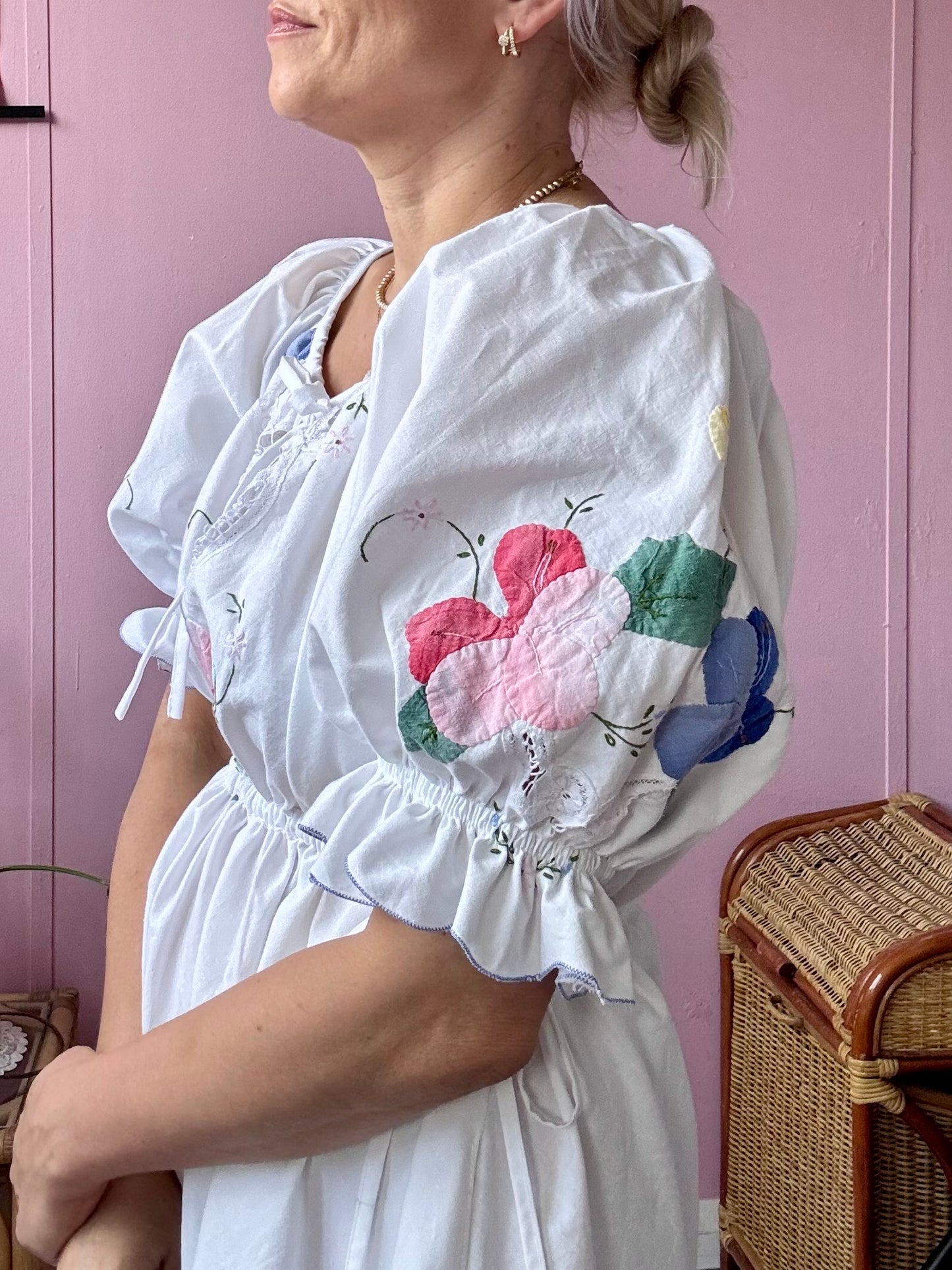 White mini dress with floral appliqués