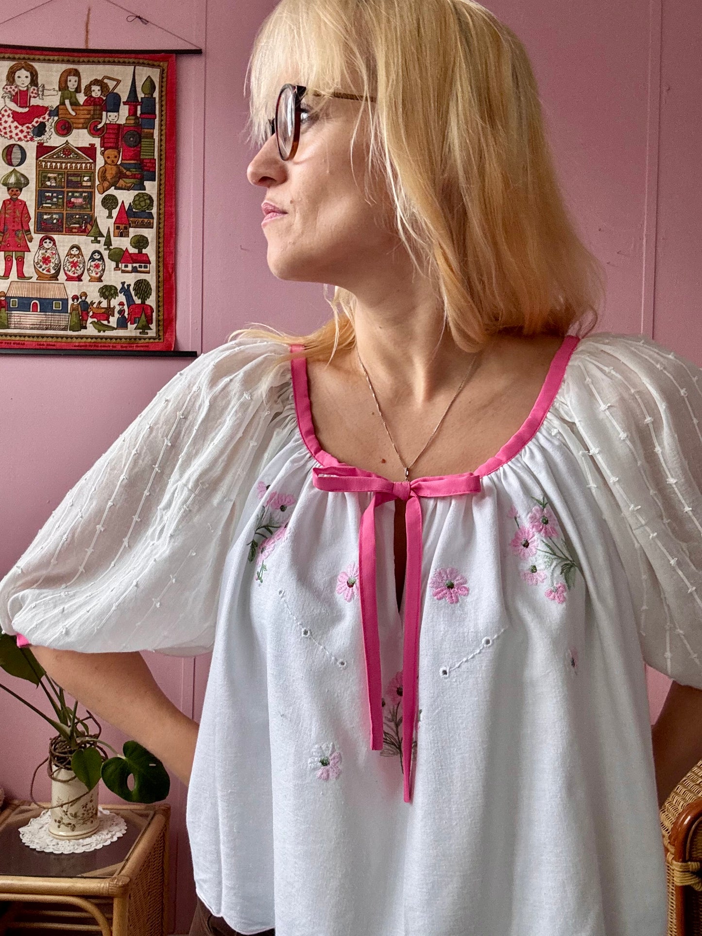 White blouse with pink binding
