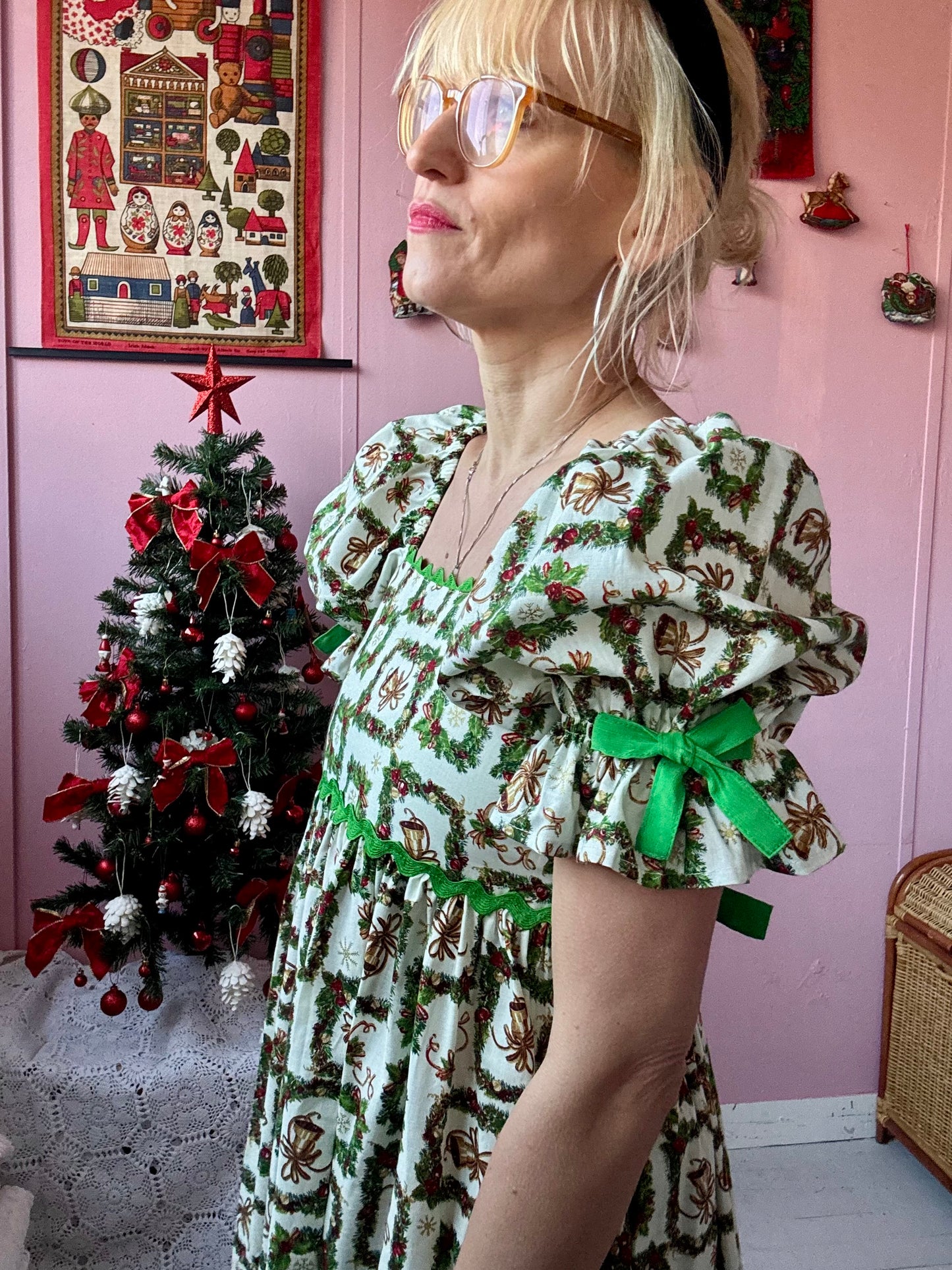 Christmas print midi dress with green ric rac and green bows