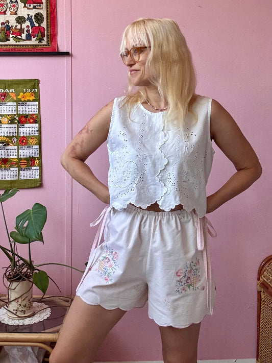 Cream shorts with pink bows