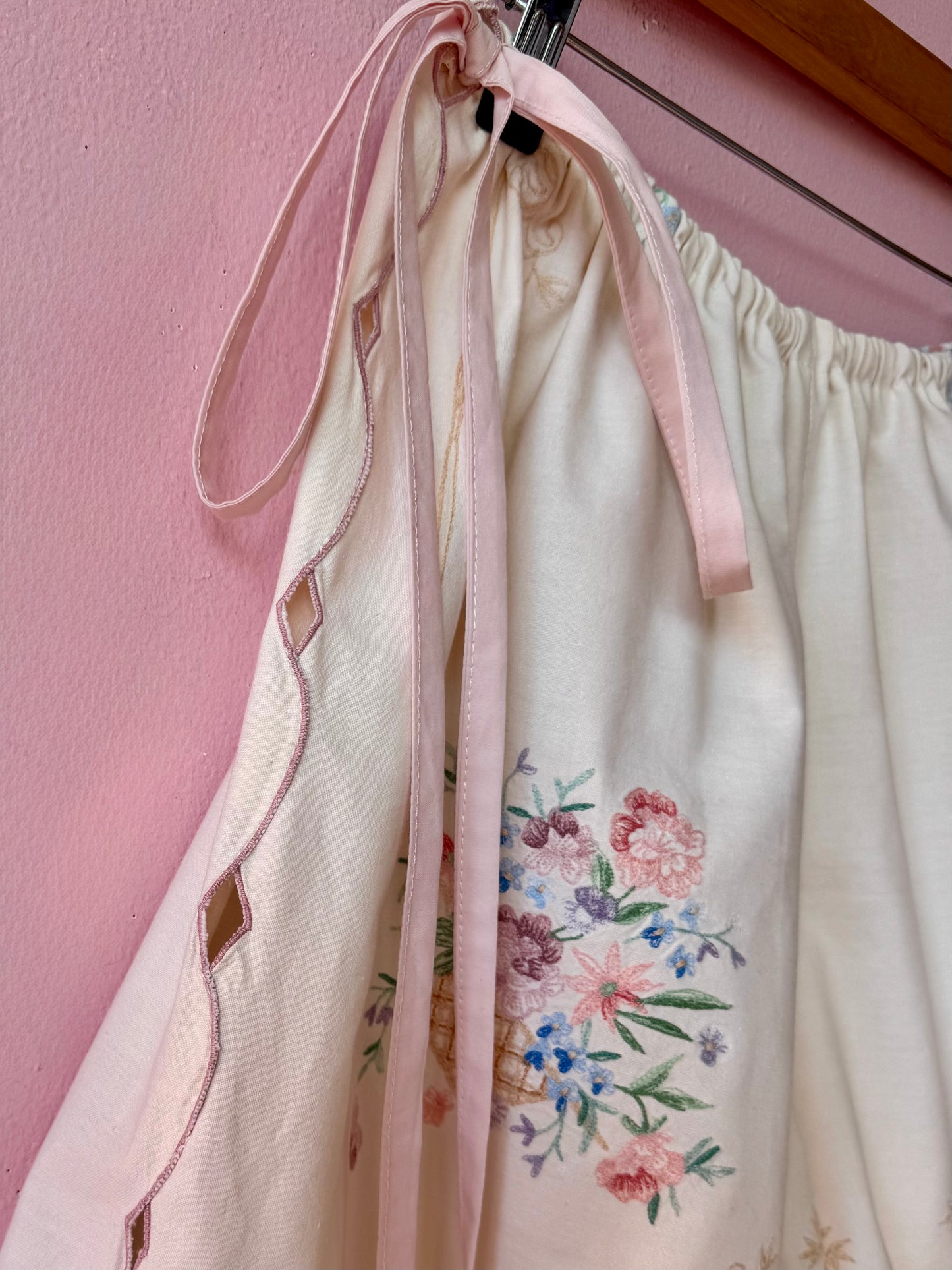 Cream shorts with pink bows
