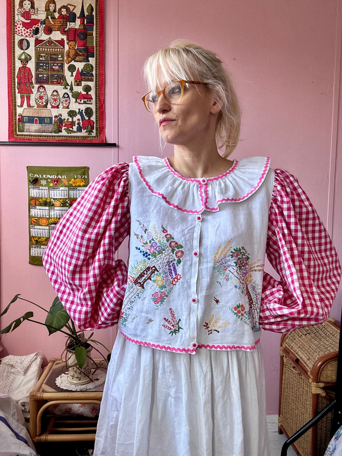 Pink gingham and floral blouse with neckline frill
