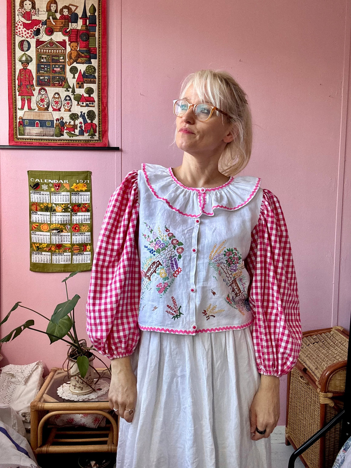 Pink gingham and floral blouse with neckline frill