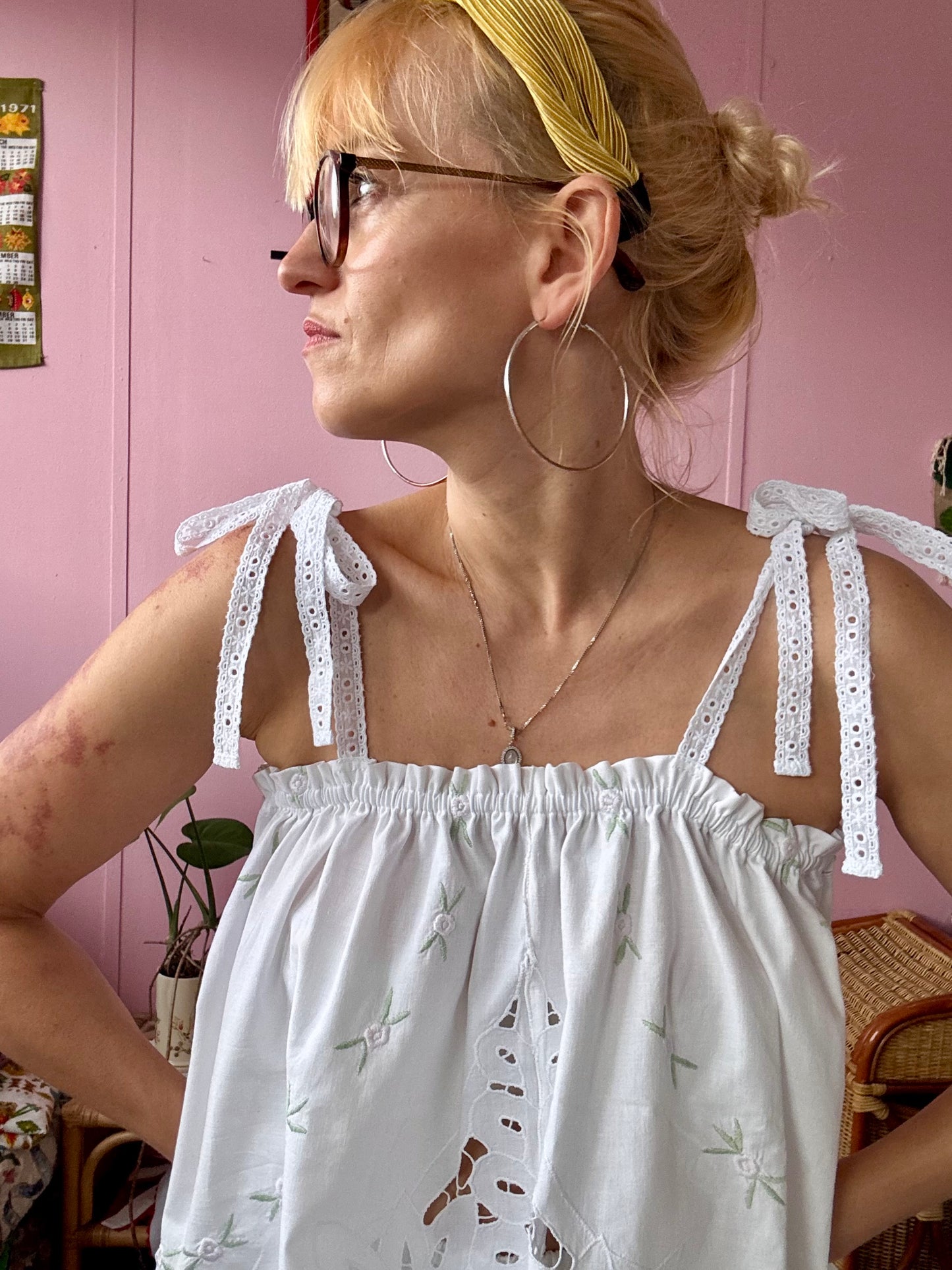 Summer top with embroidery and lace straps