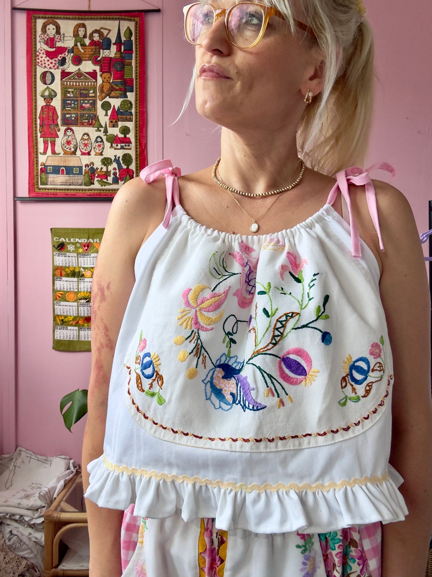 Embroidery top with pink straps