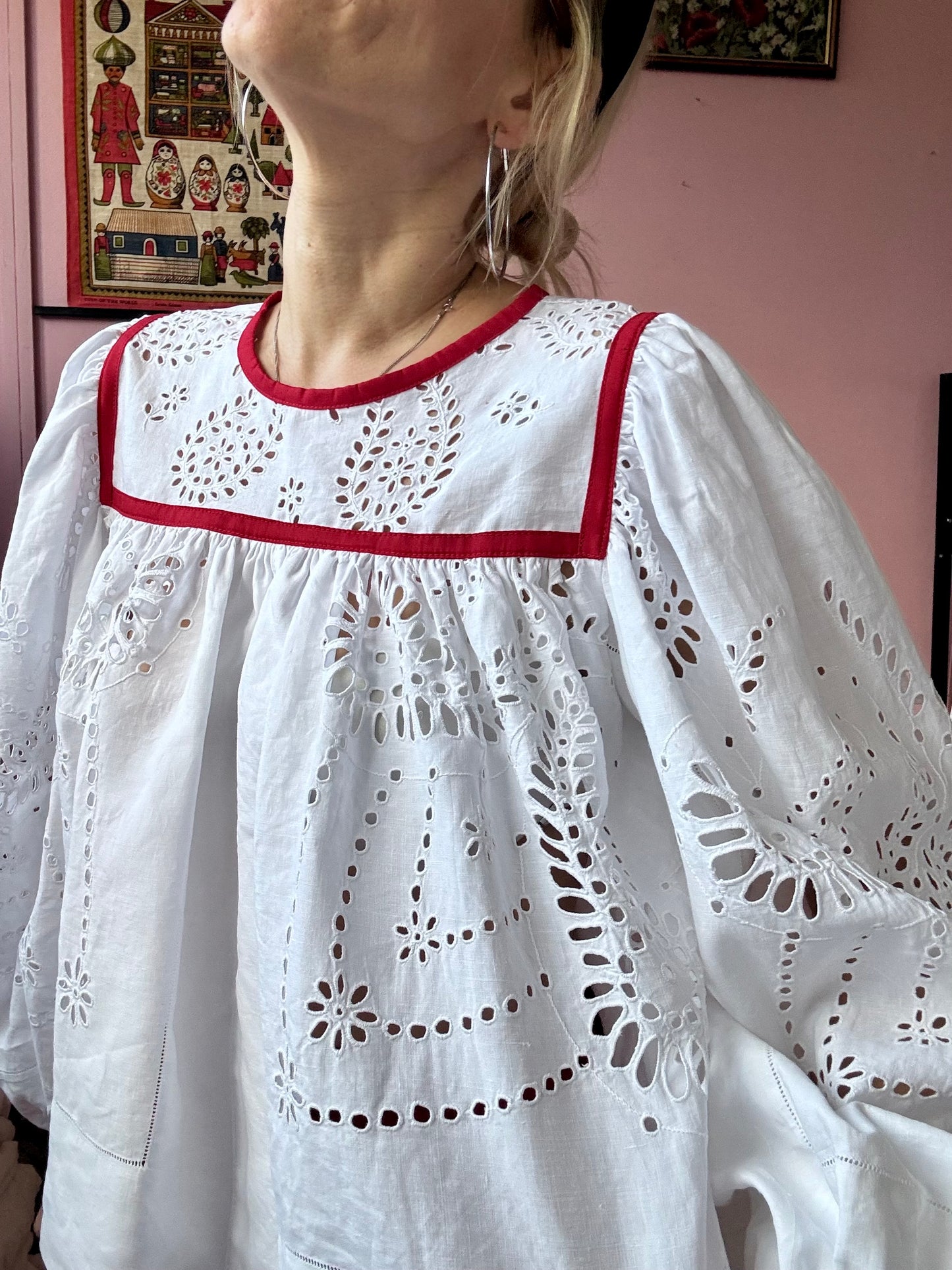 White blouse with red binding