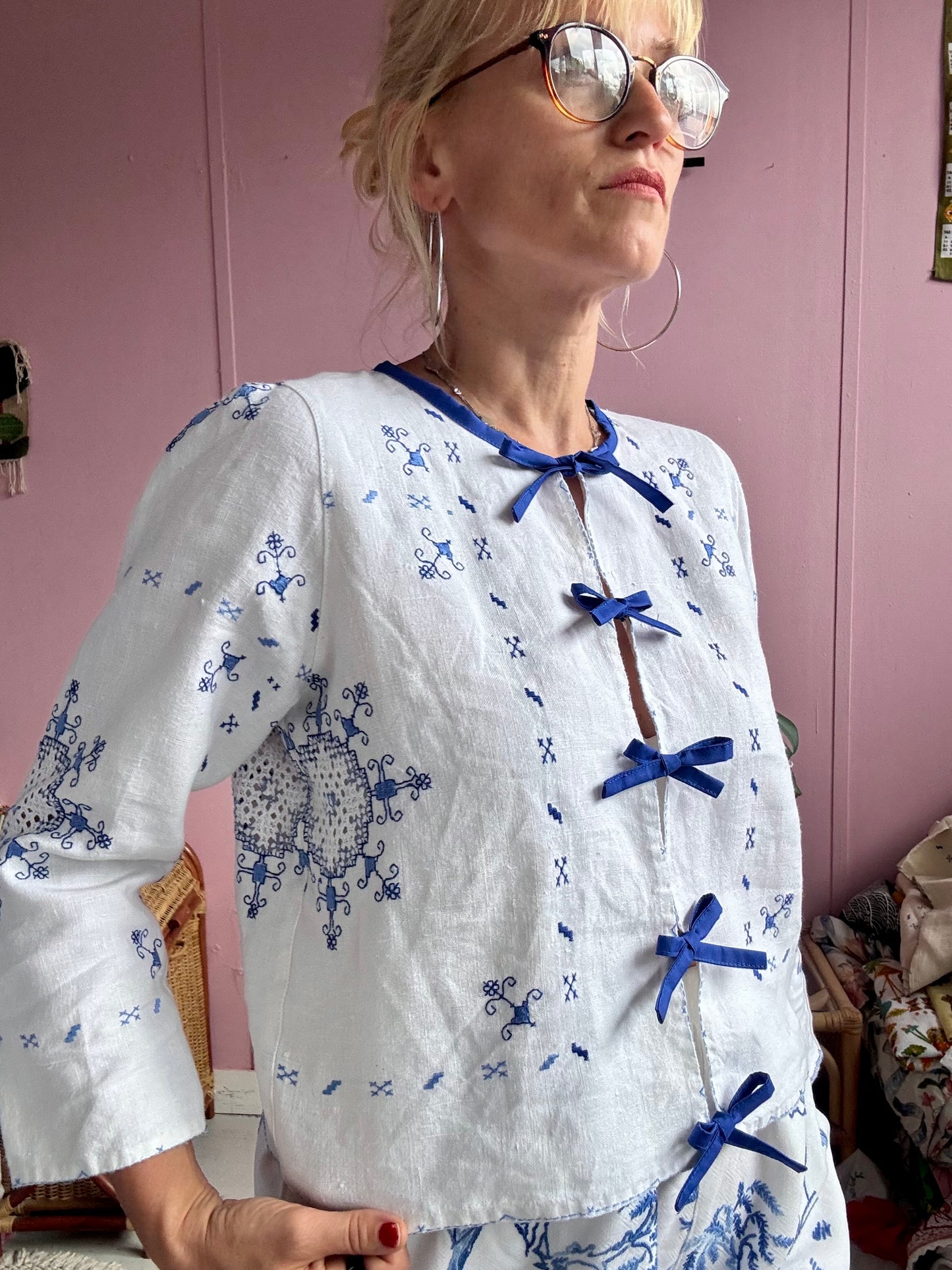 White linen blouse/light jacket with blue bows