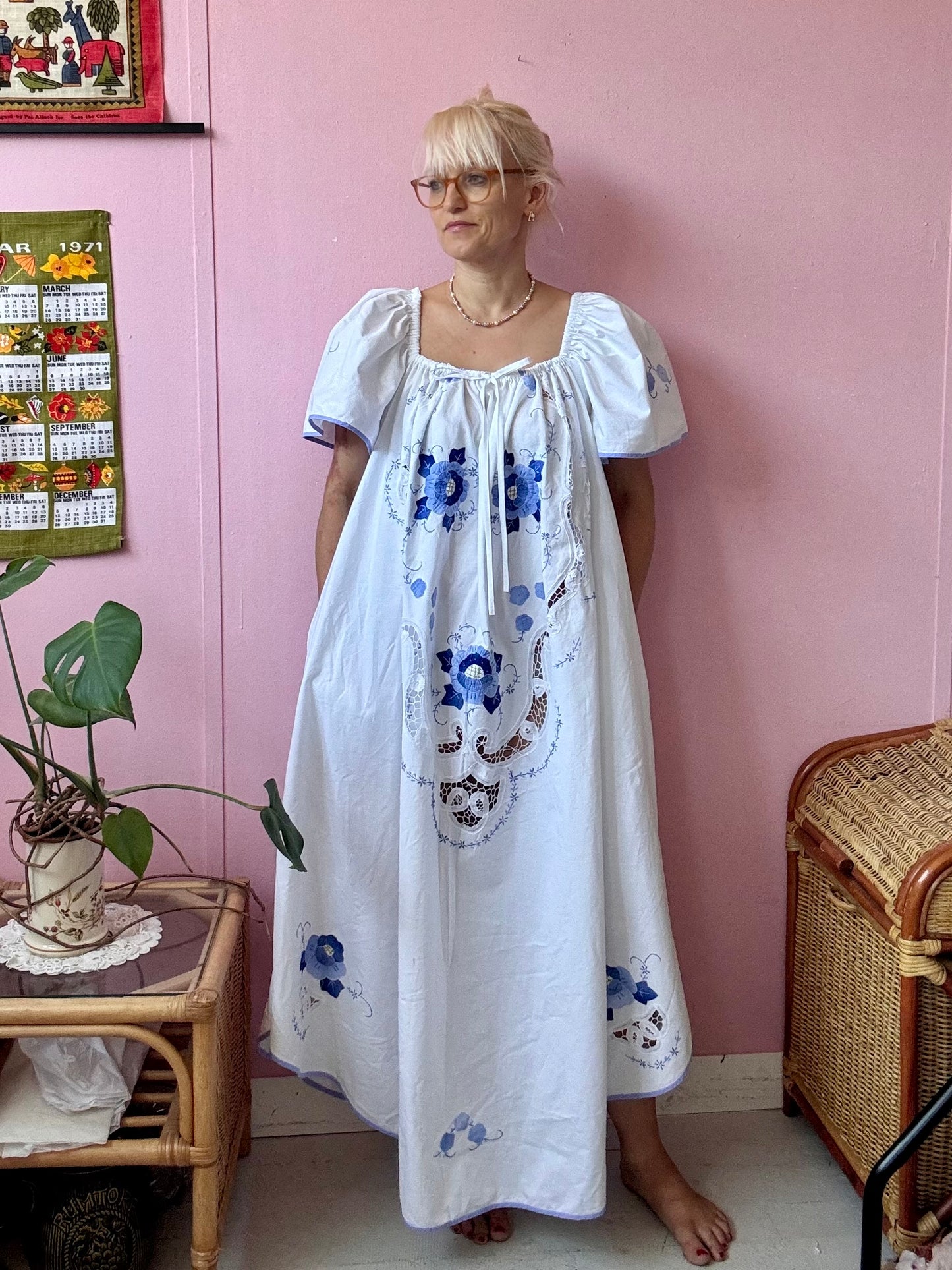 Maxi dress with blue floral appliqués